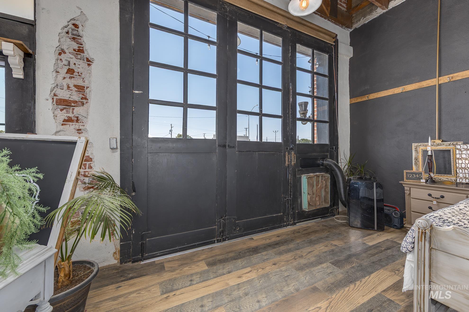 Foyer with wood finished floors