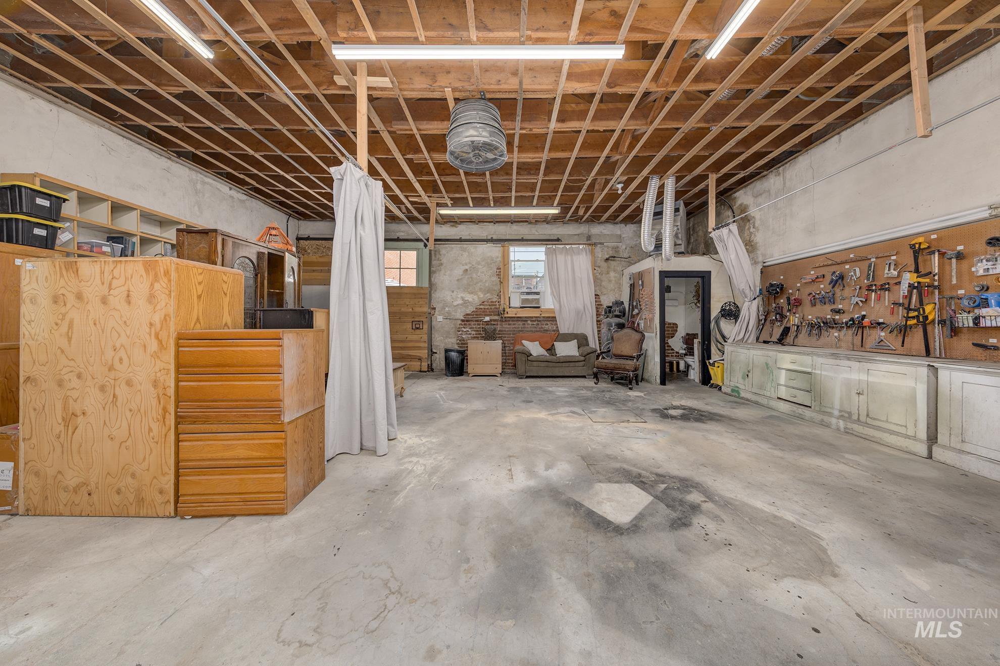 Below grade area featuring a workshop area