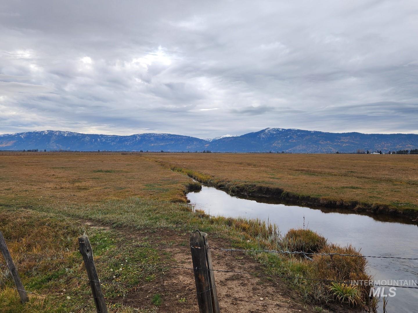 Mountain view featuring rural landscape and a large body of water