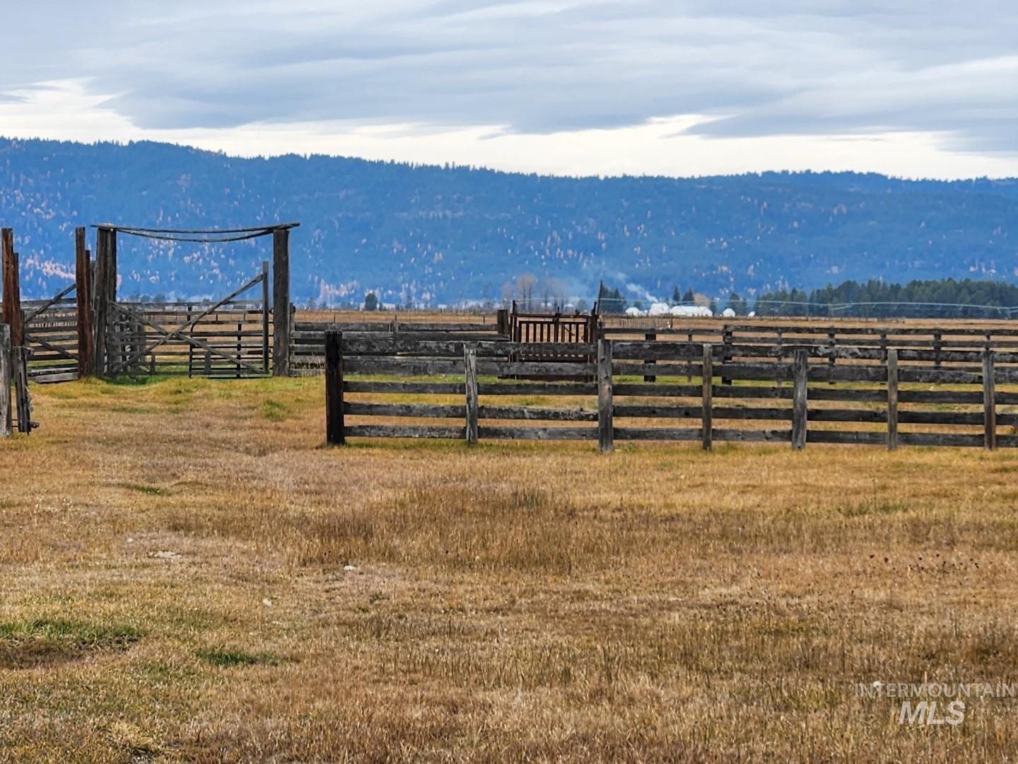 View of yard with a view of countryside and a mountain view