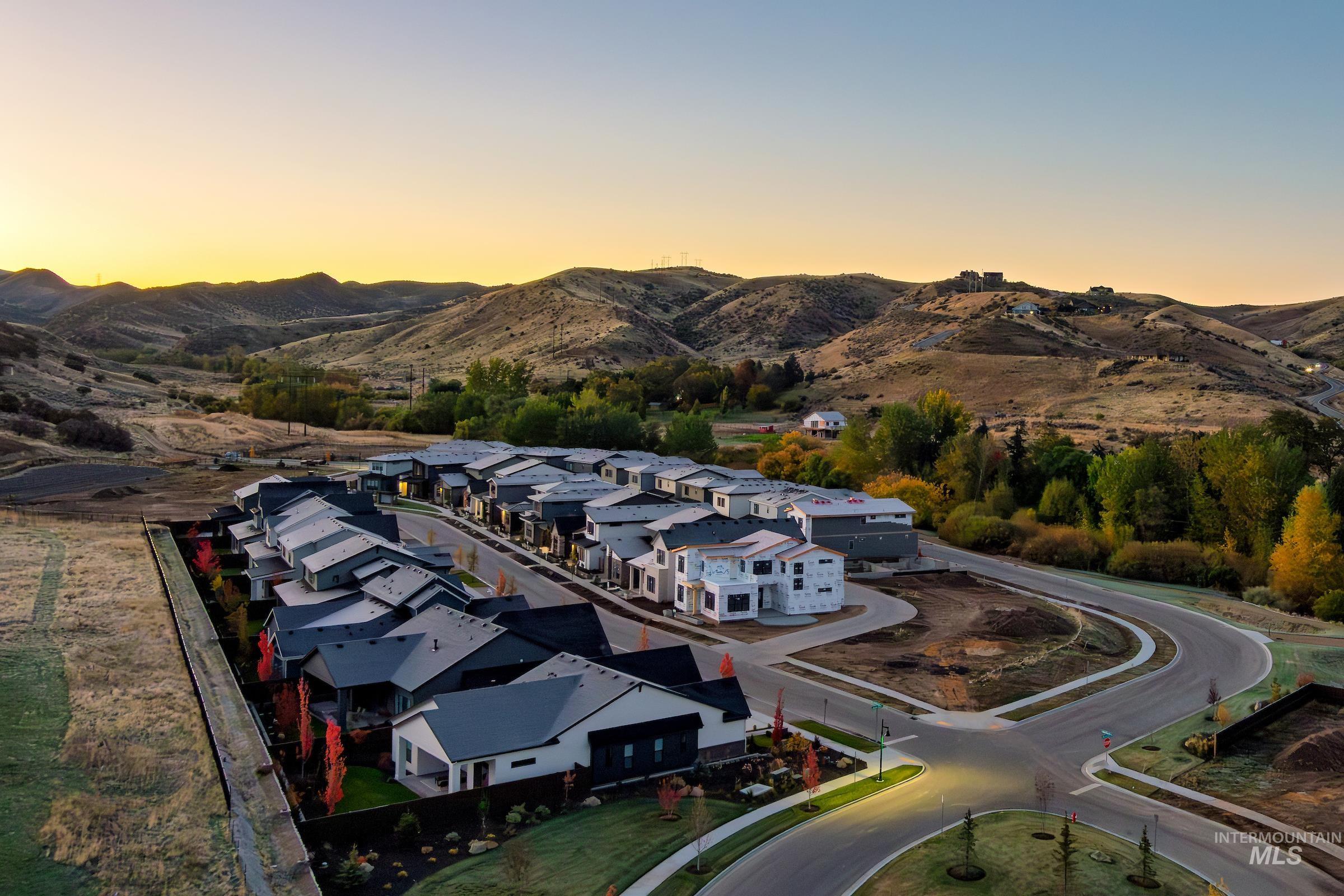 Aerial view of residential area with a mountainous background