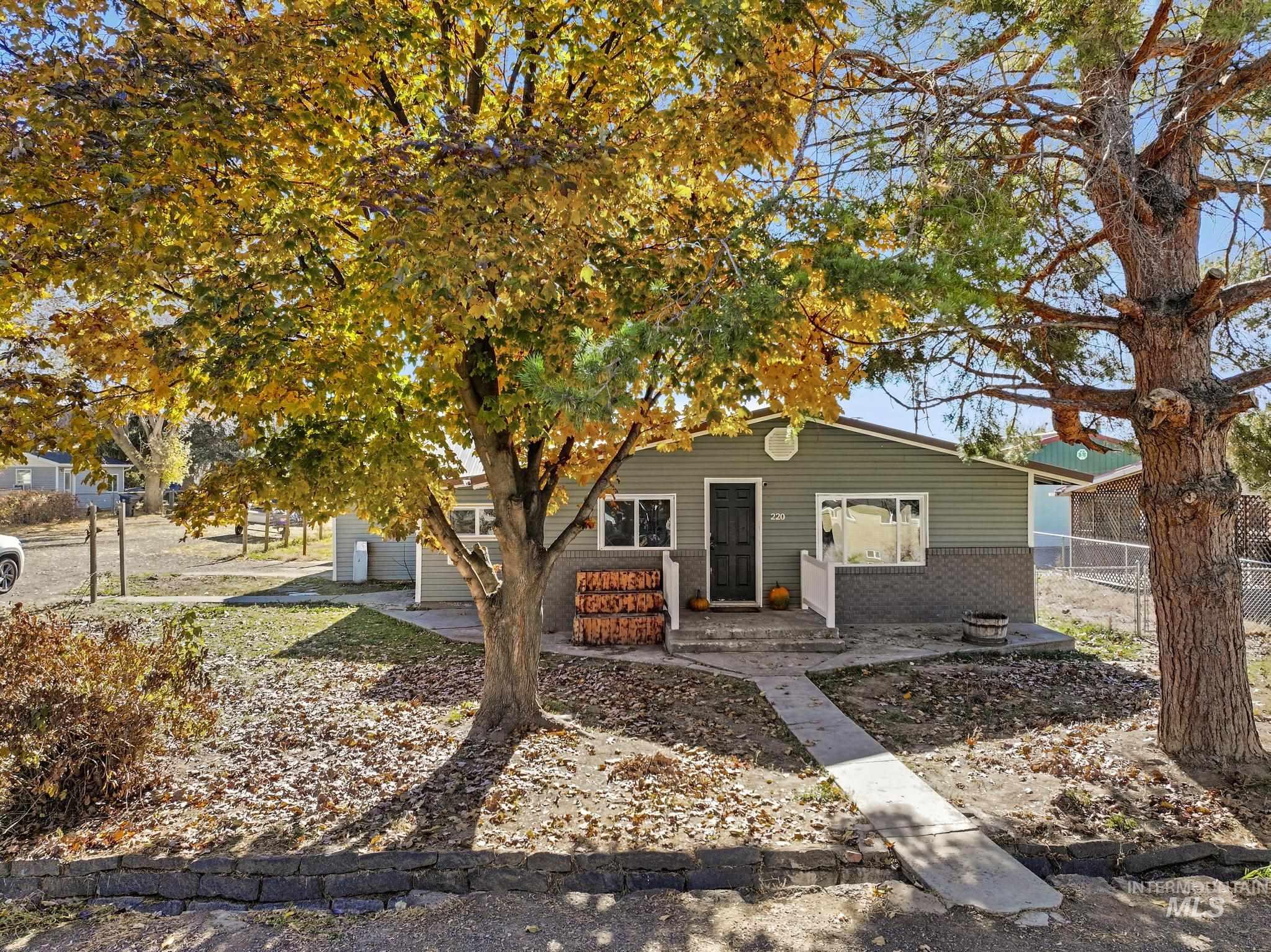 View of front of house featuring brick siding
