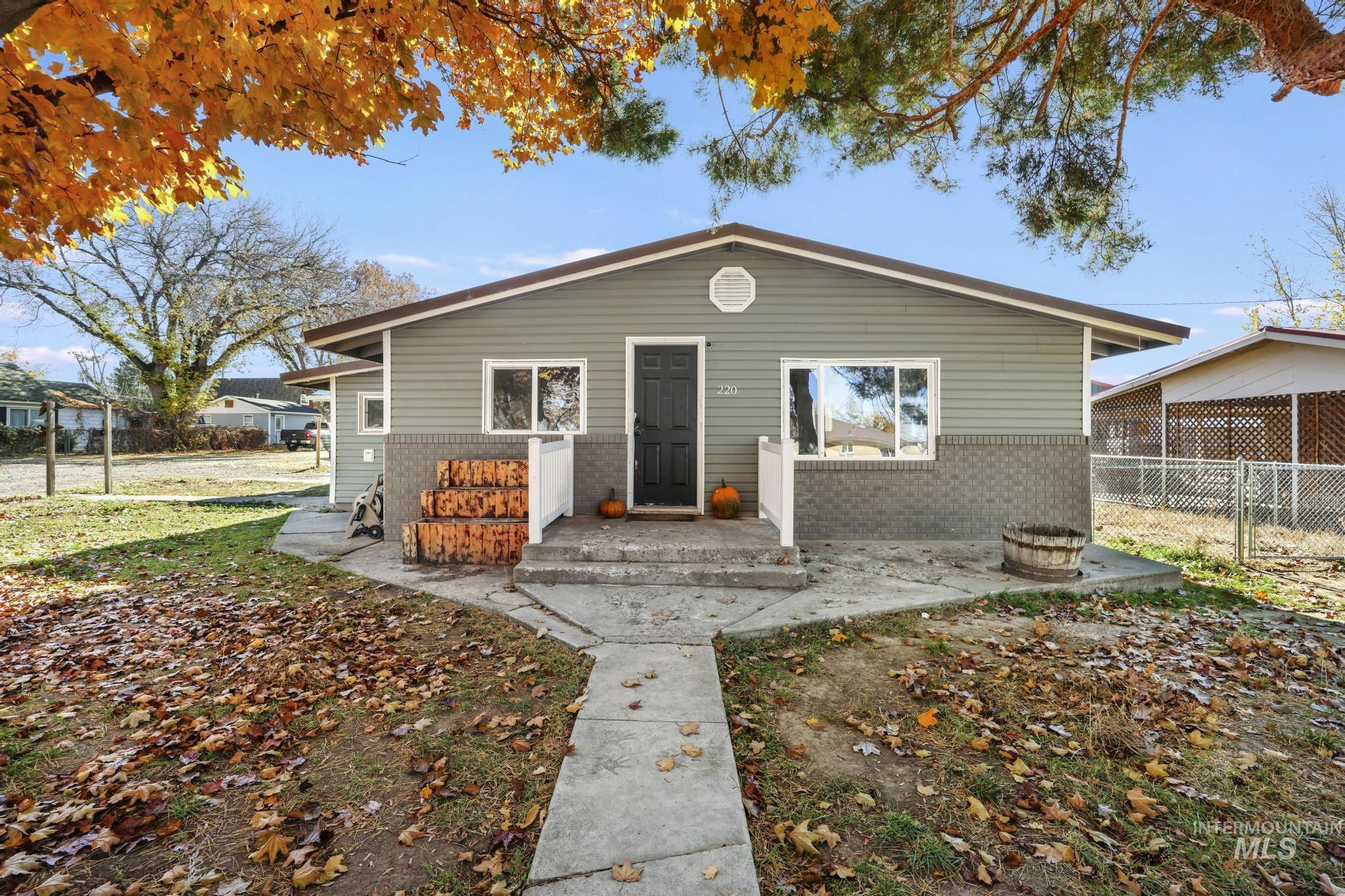 View of front of property featuring brick siding