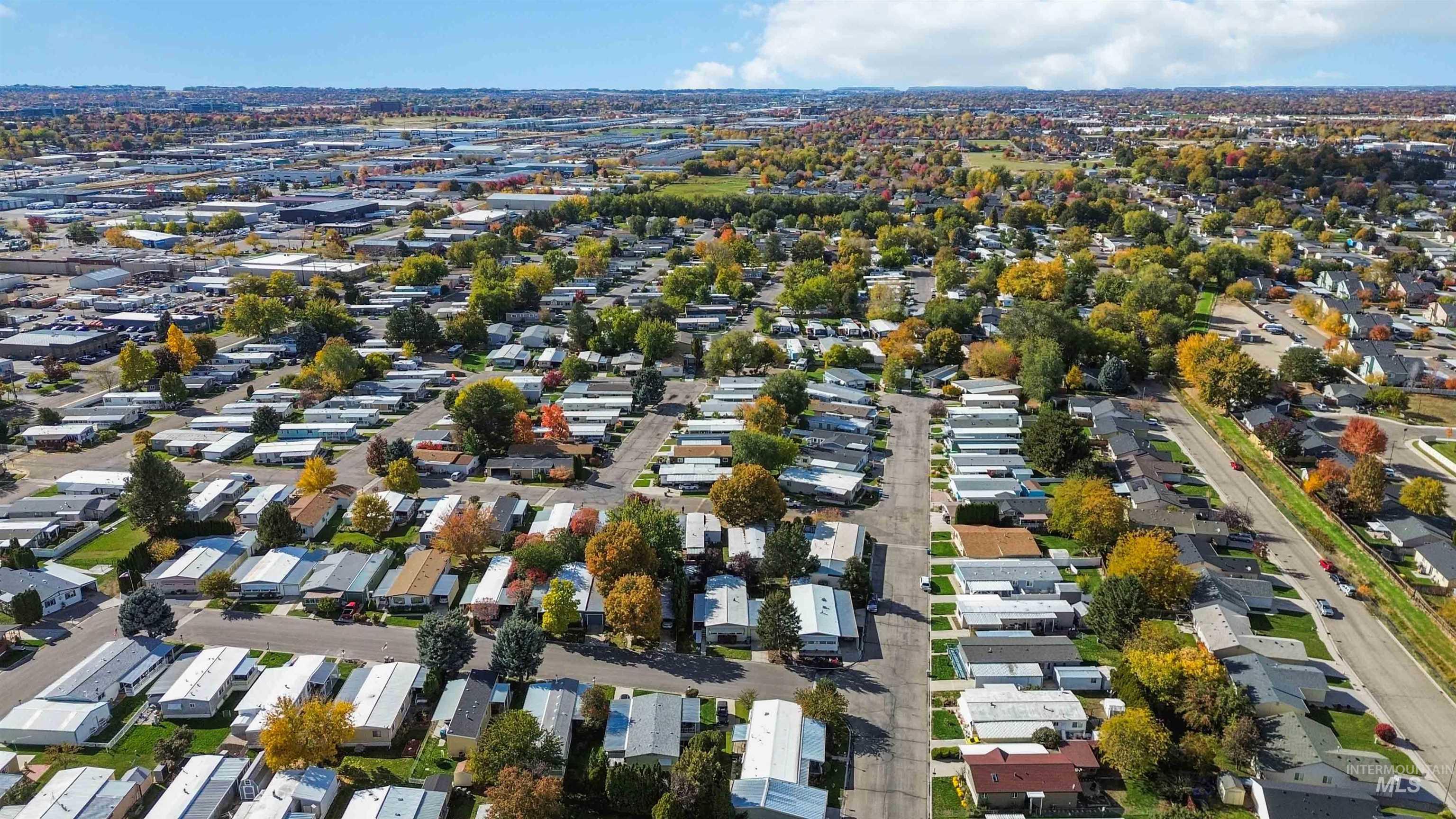 View of property location with nearby suburban area