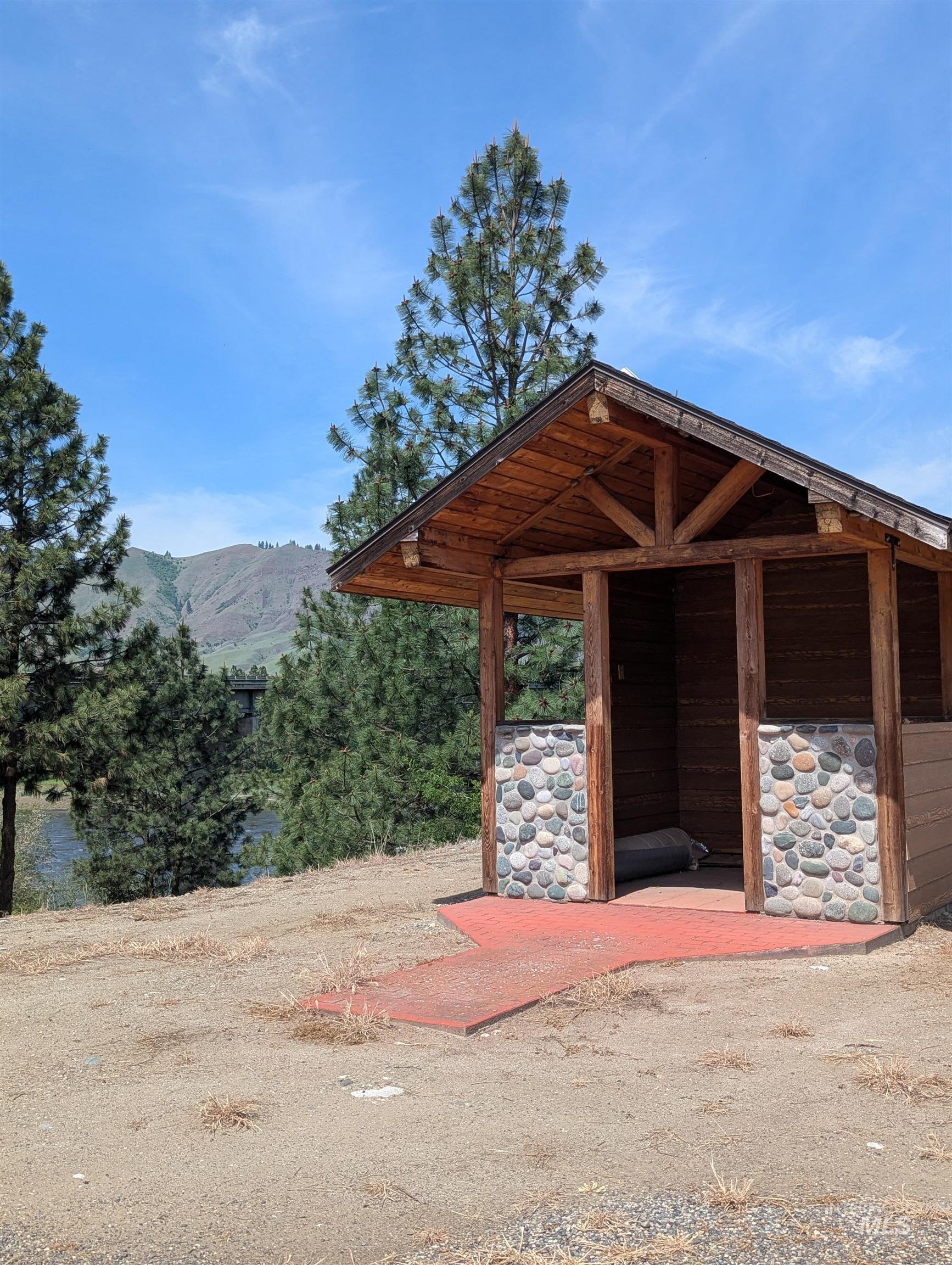 Stable featuring a water and mountain view