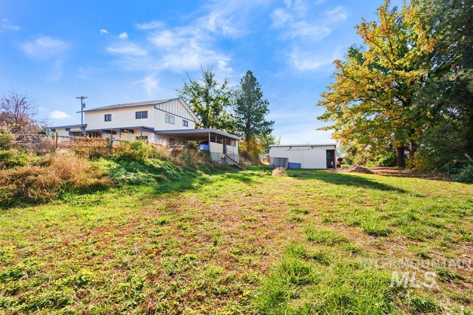 View of green lawn with an outdoor structure