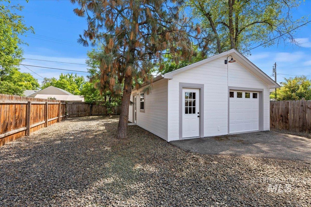 Detached garage with driveway
