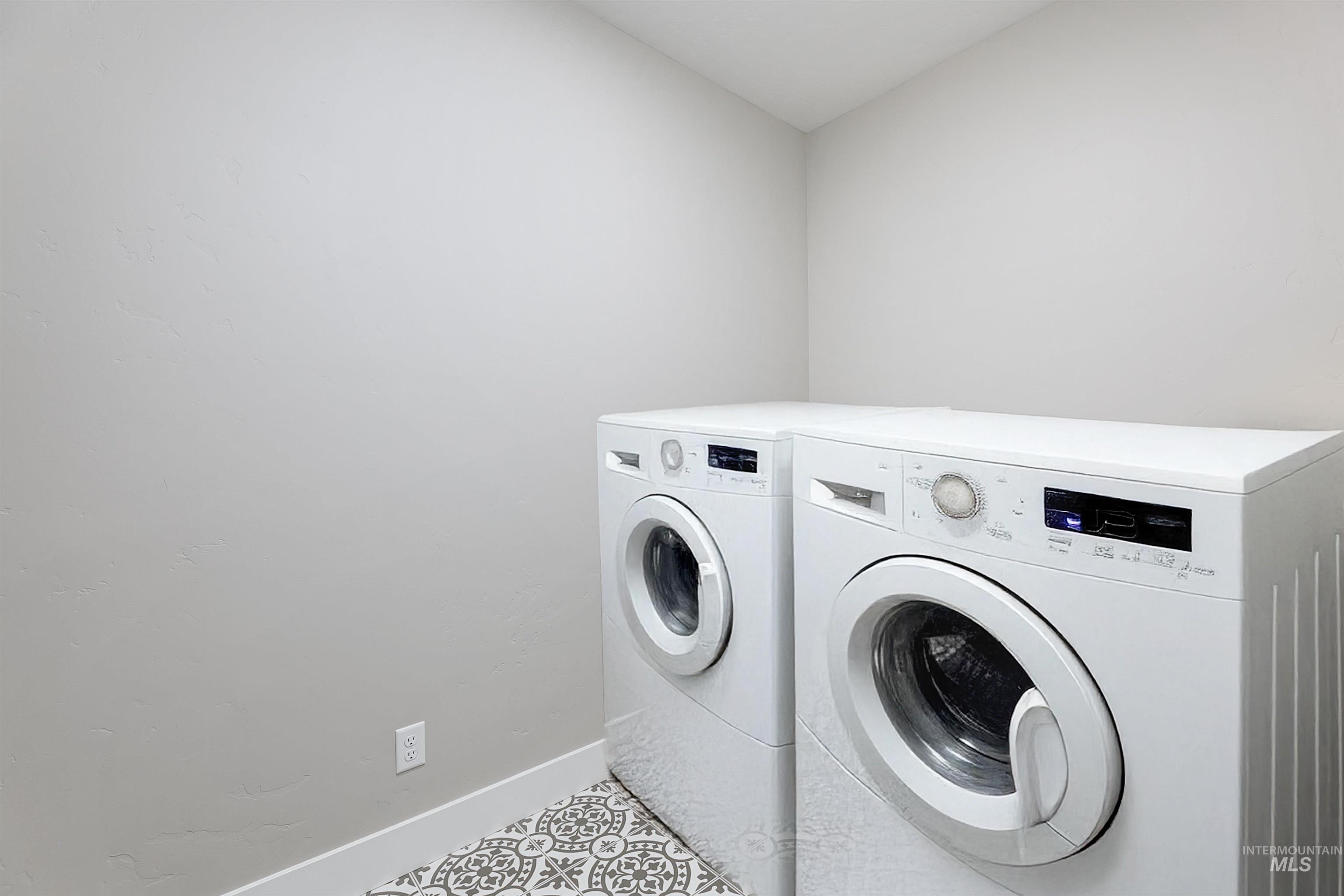 Convenience of a second laundry room upstairs, with built in shelving.