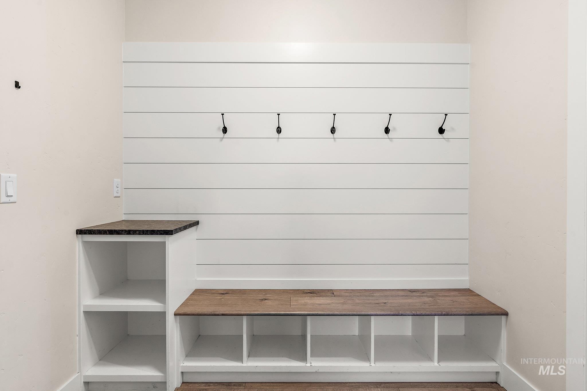 Mudroom featuring baseboards