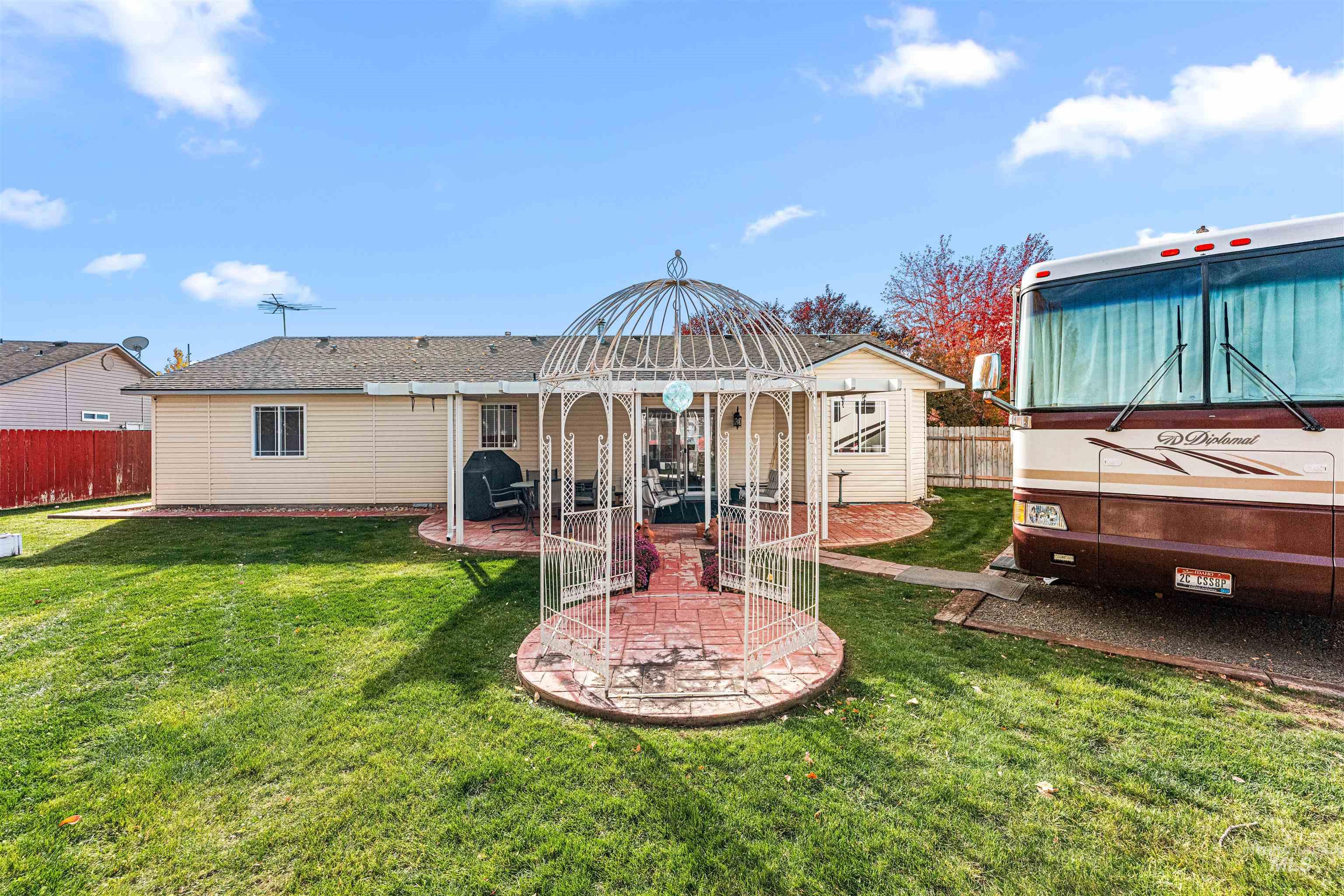 Rear view of property with a patio