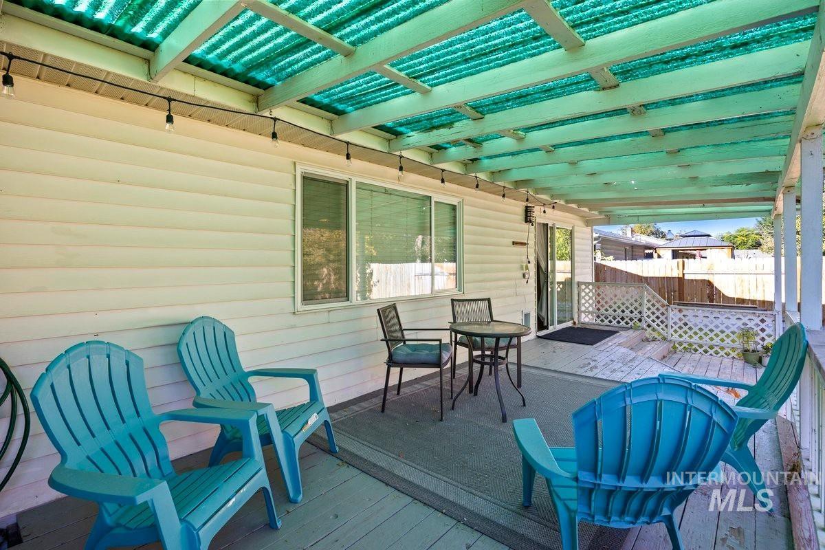 Wooden deck with outdoor dining area