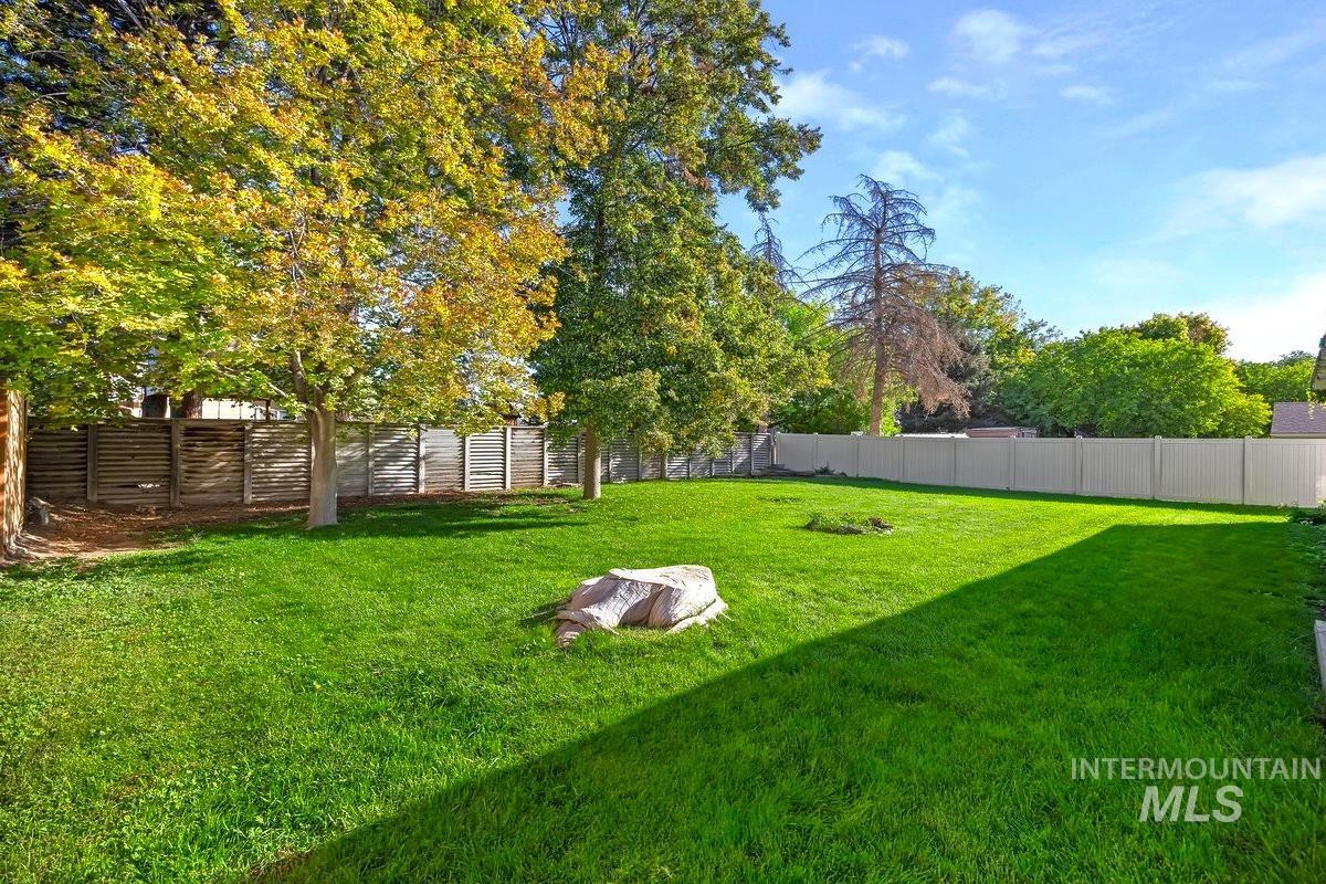 View of fenced backyard