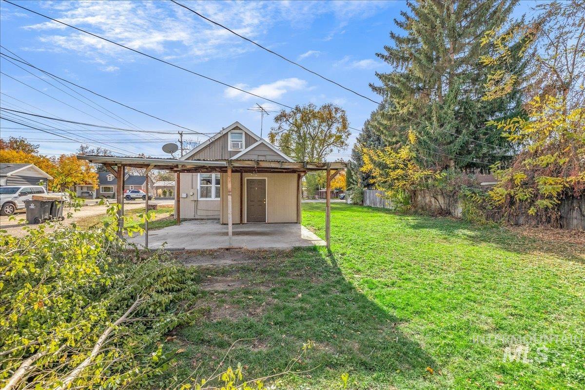 Rear view of house with a patio