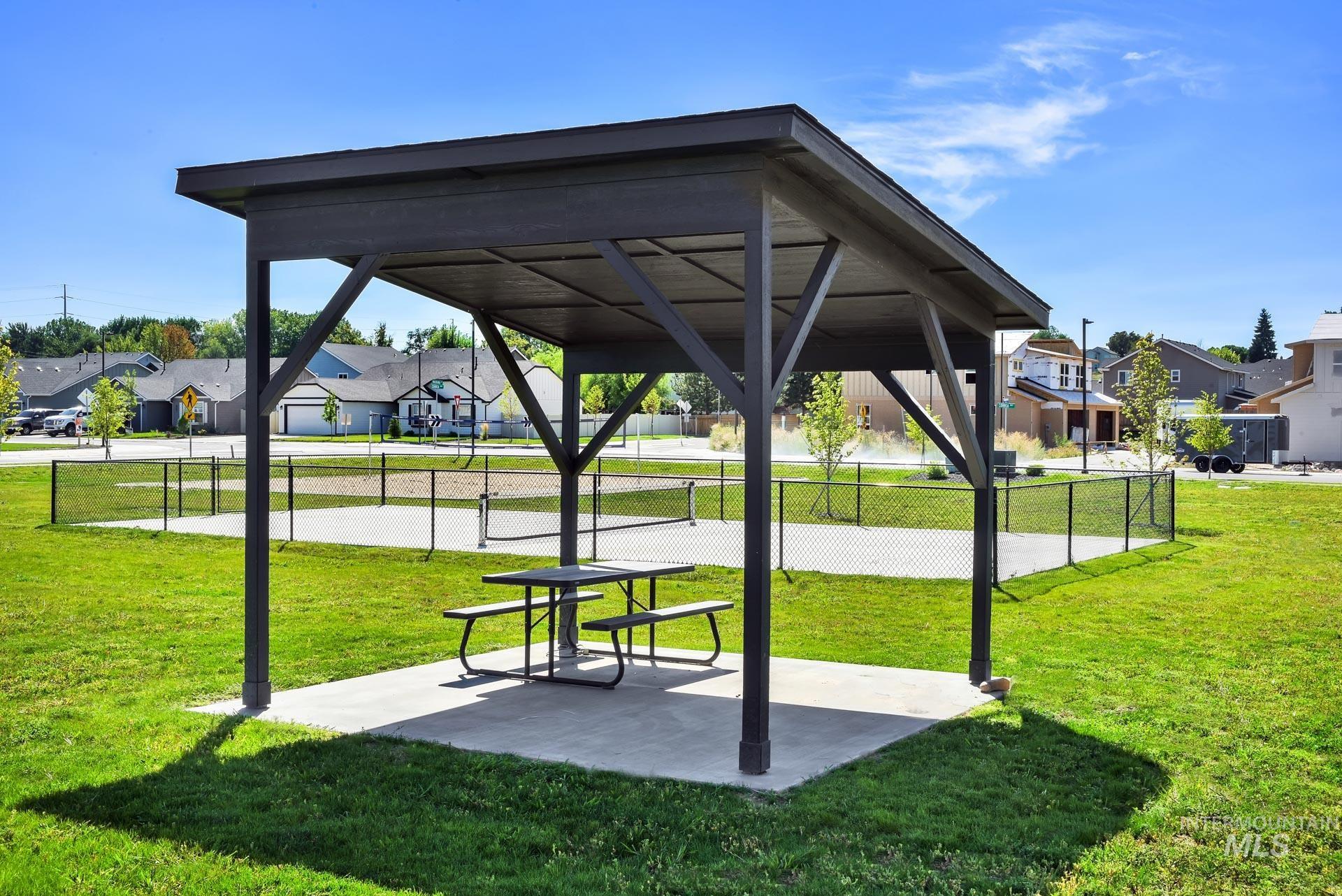 View of community featuring a residential view and a patio area