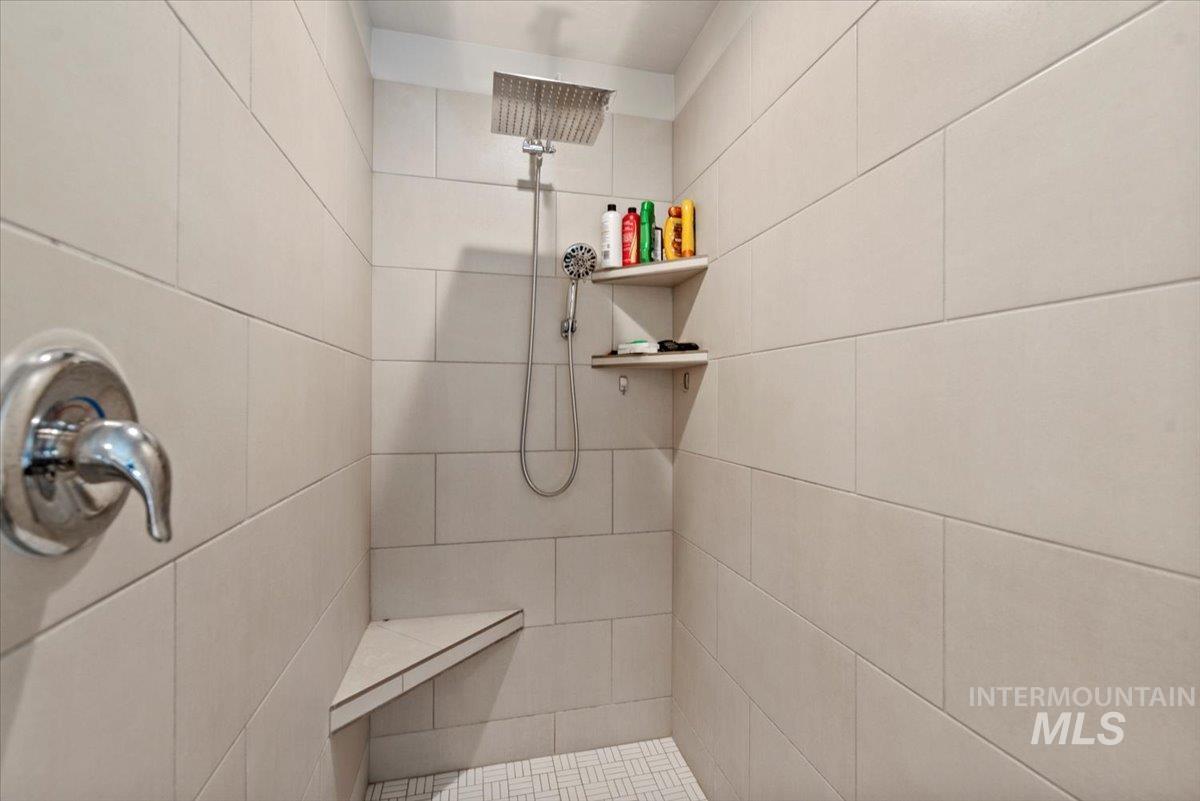Bathroom with tiled shower