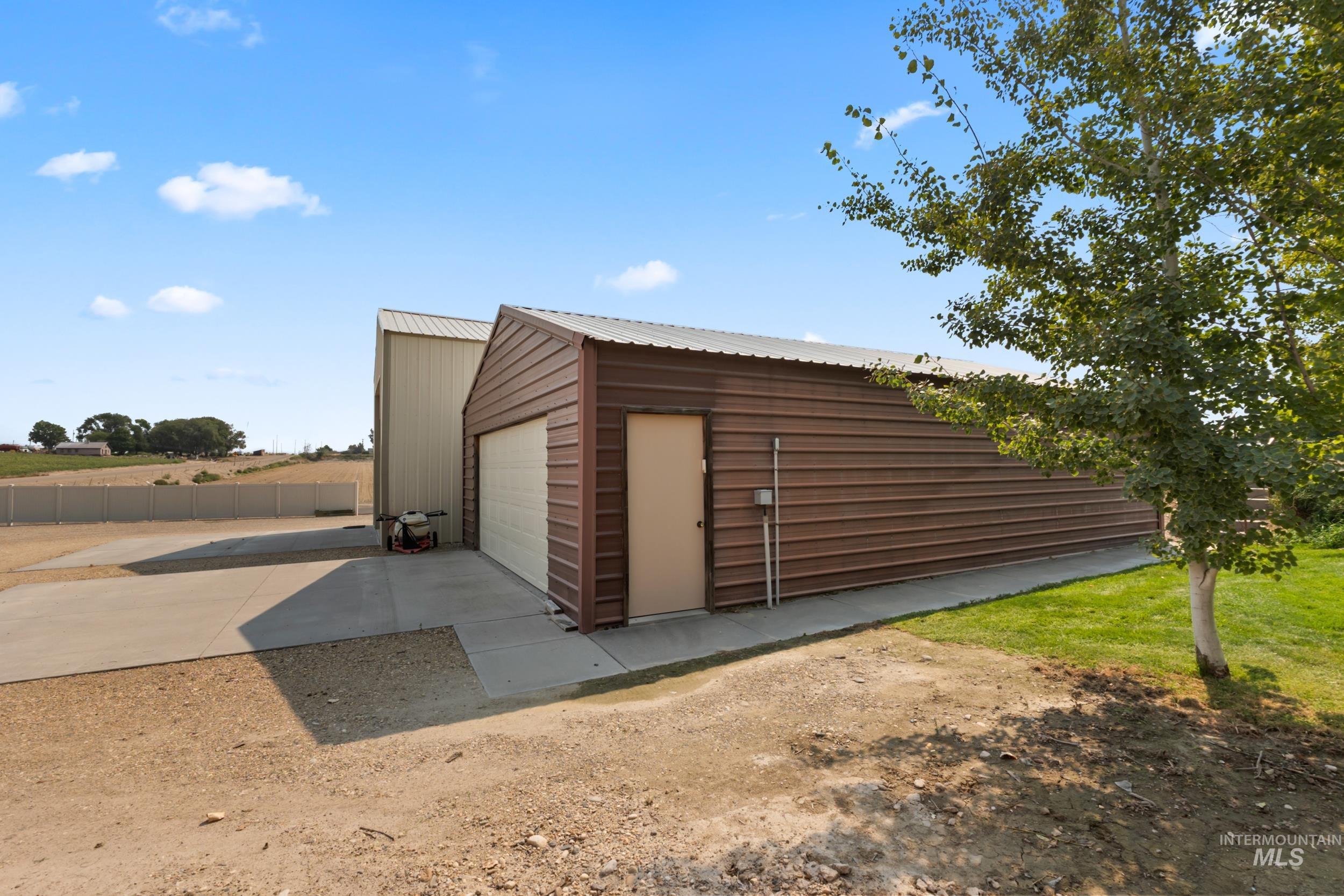 Garage featuring driveway