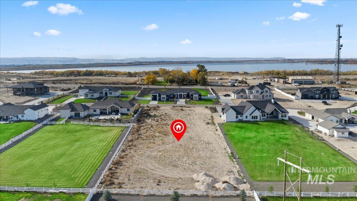 Aerial view of residential area with a large body of water