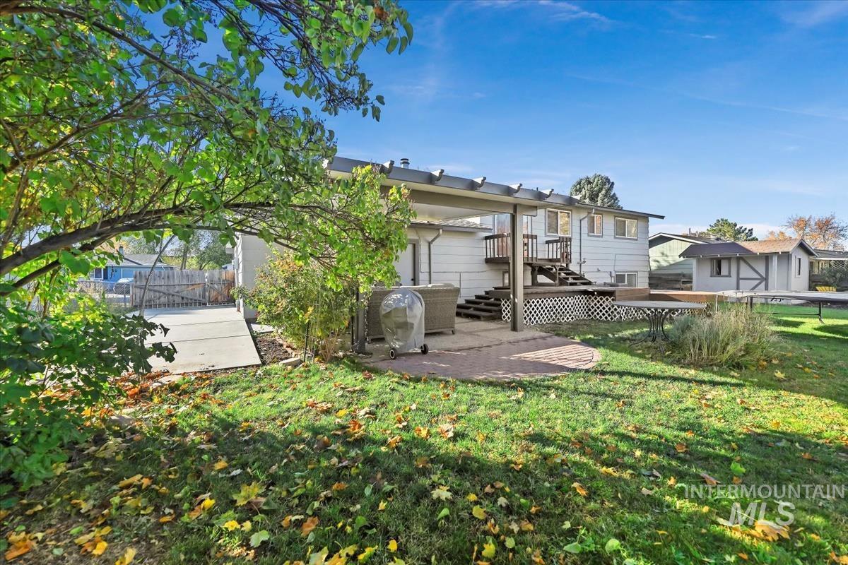 Rear view of property with a patio