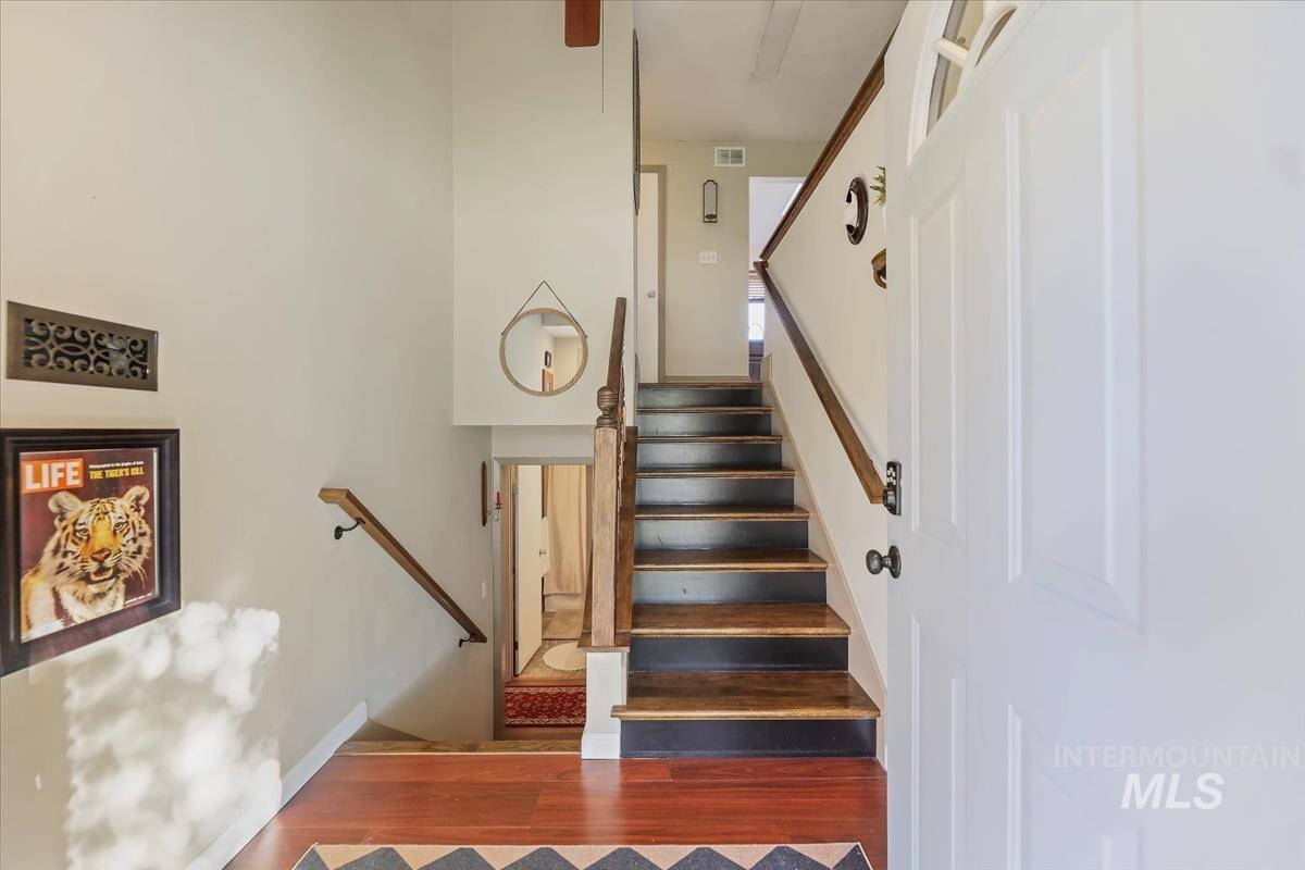 Stairway with wood finished floors