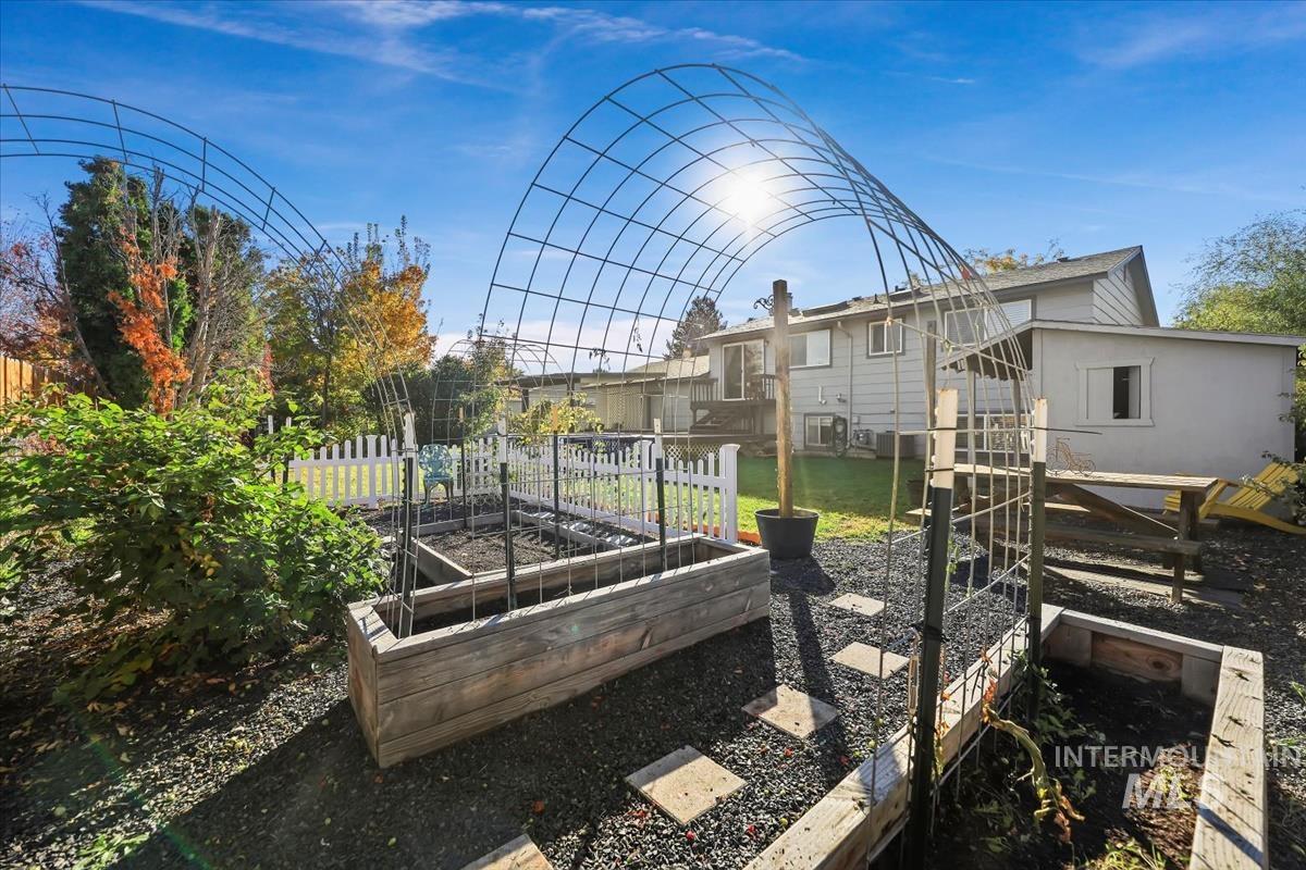 View of yard with a vegetable garden