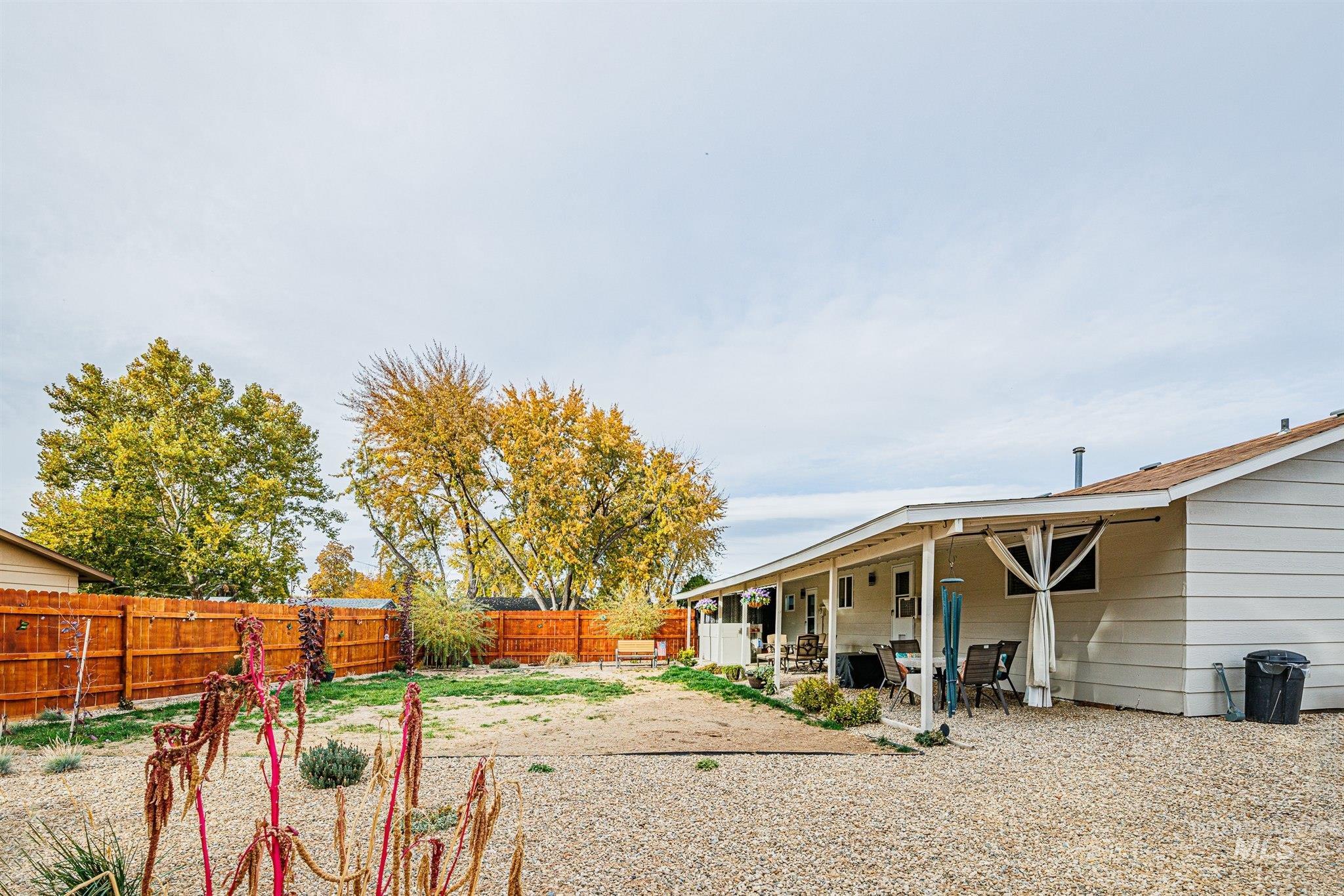 Fenced backyard featuring a patio area