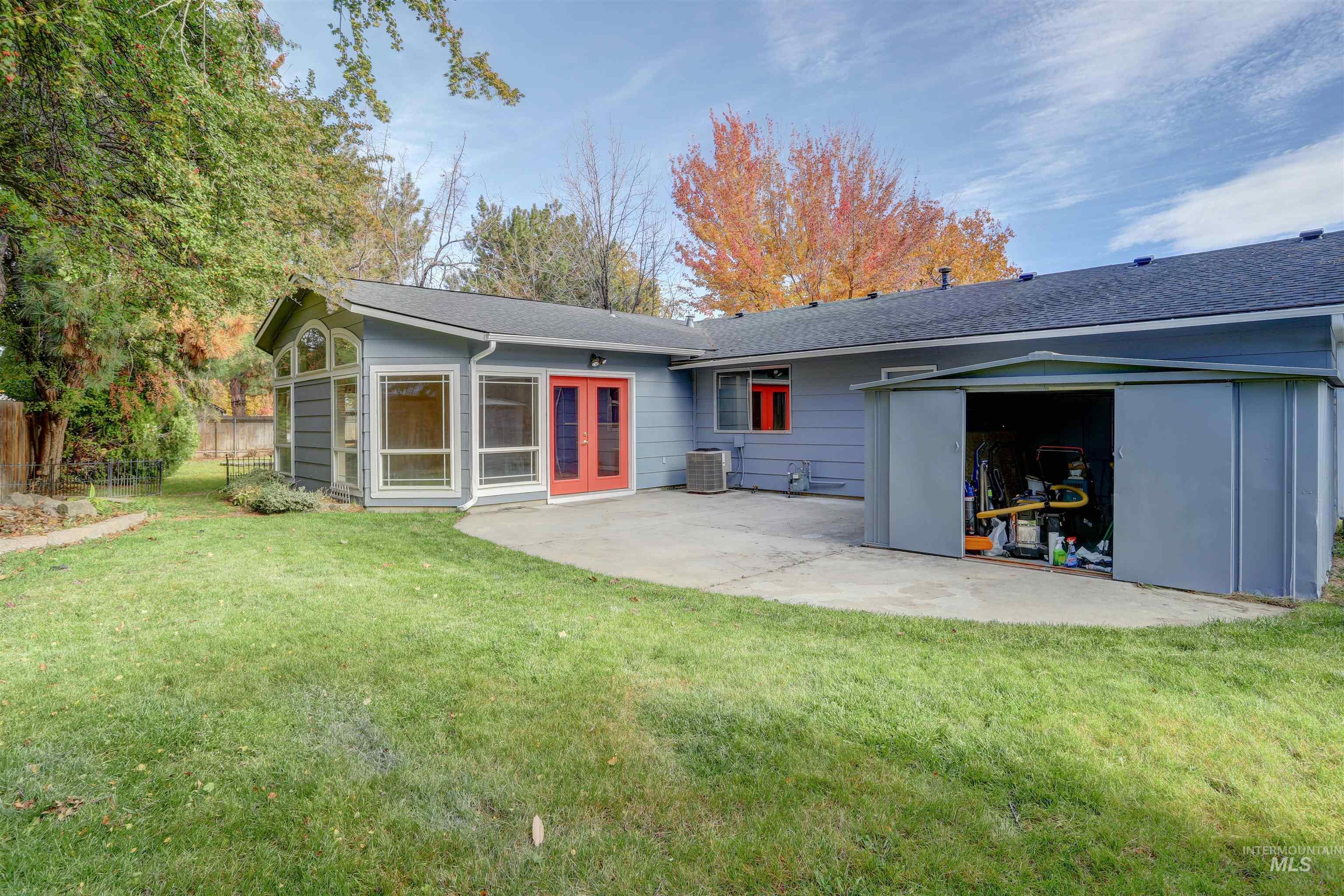 Back of house with a patio