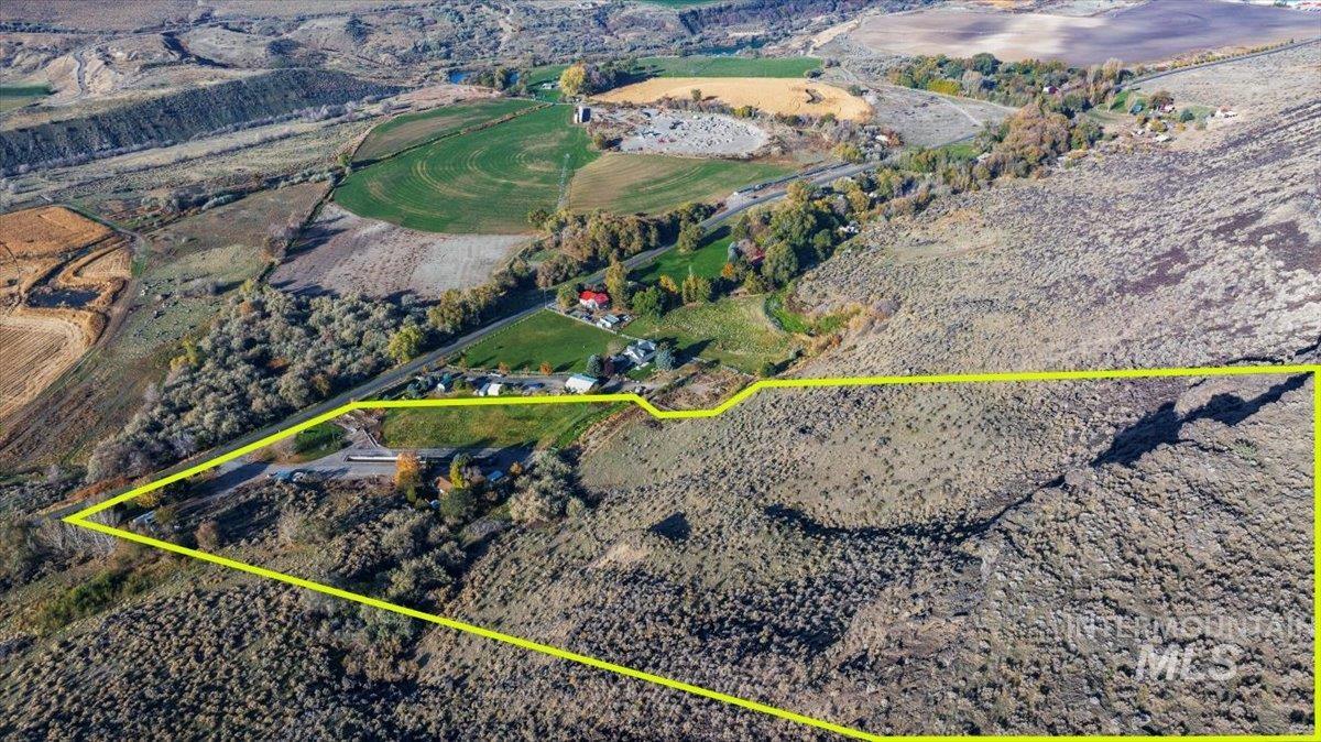 Aerial overview of property's location with property parcel outlined