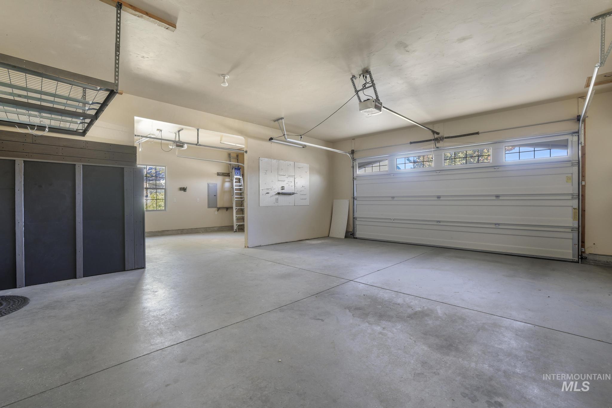 Garage featuring electric panel
