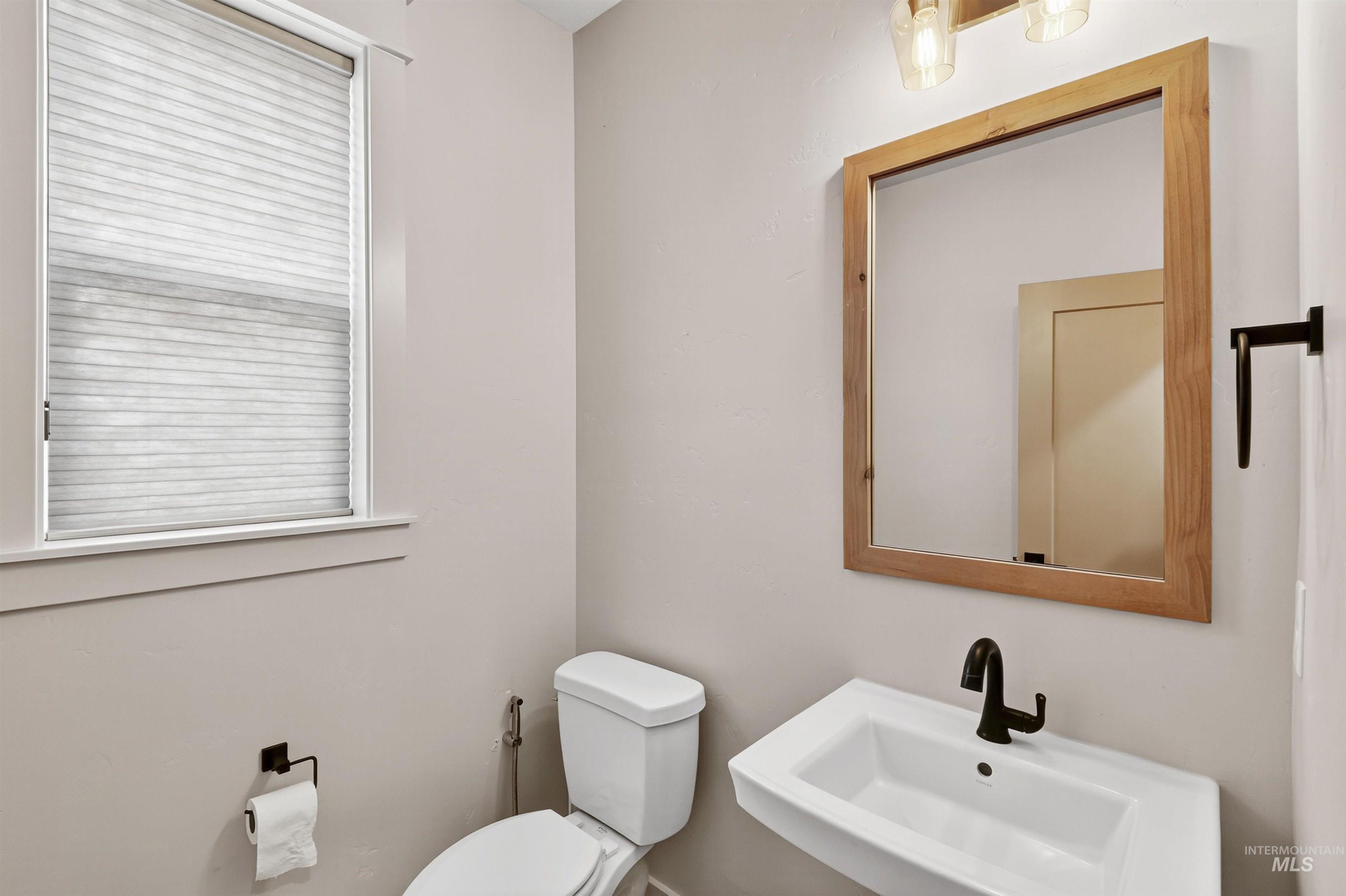 Bathroom featuring a sink and toilet