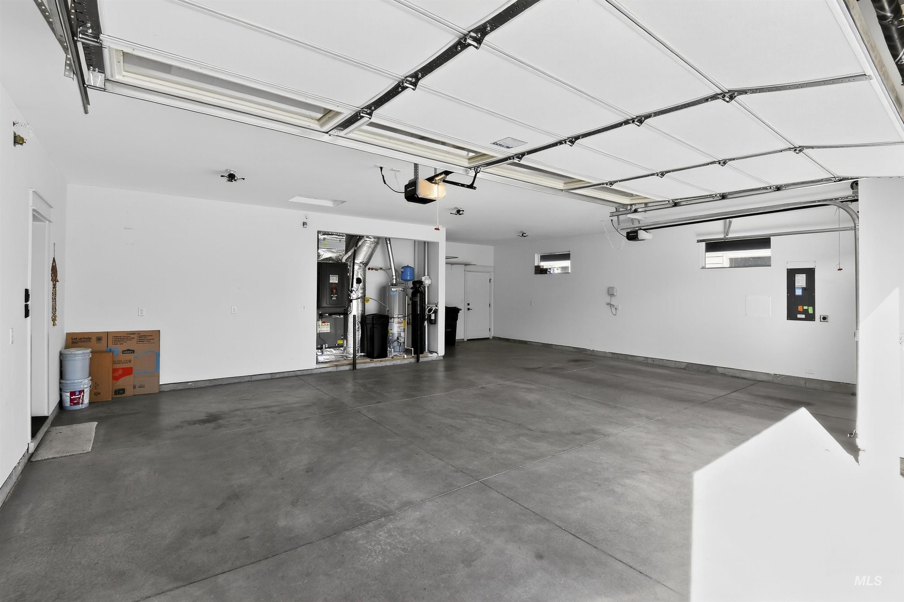 Garage featuring electric panel