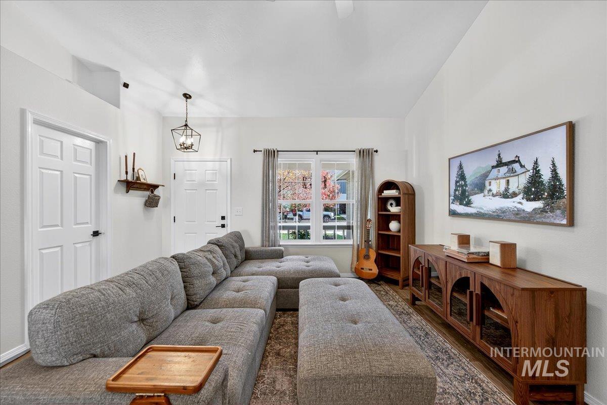 Living area featuring wood finished floors and baseboards