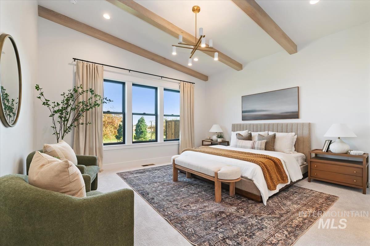 Bedroom featuring carpet, recessed lighting, and a chandelier