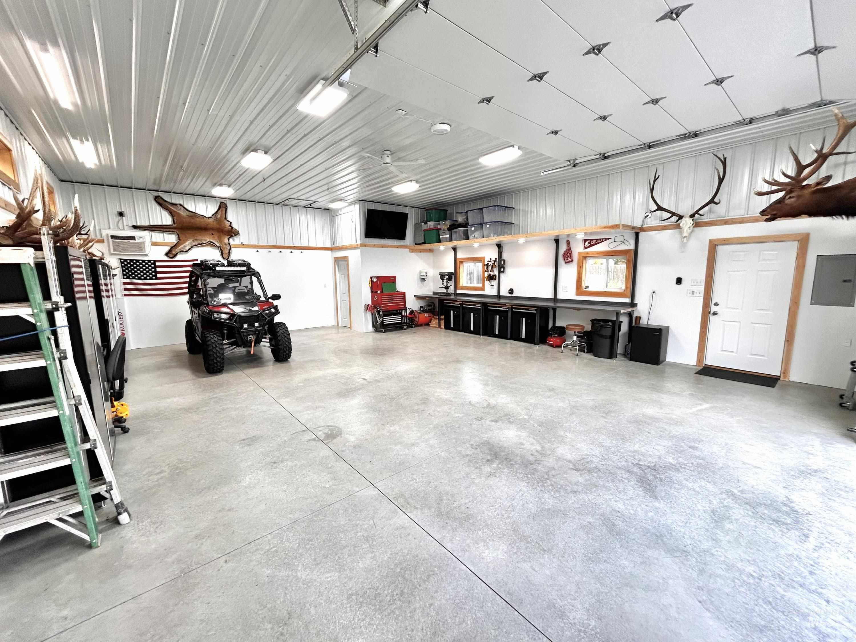 Garage featuring electric panel