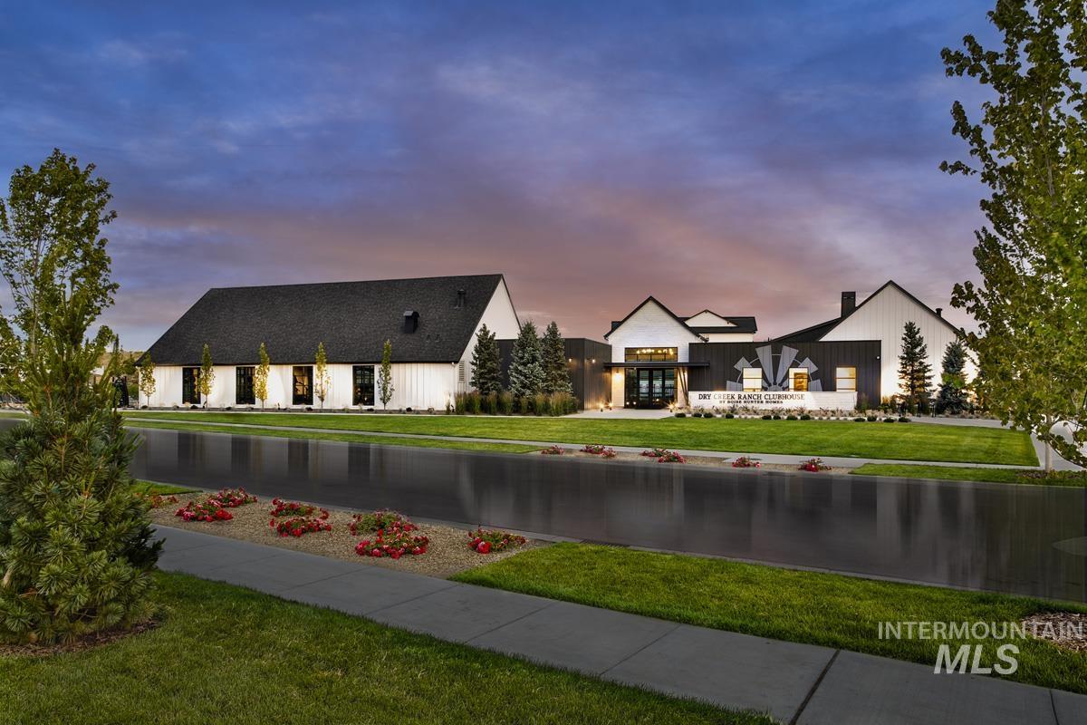 View of front of property featuring a yard