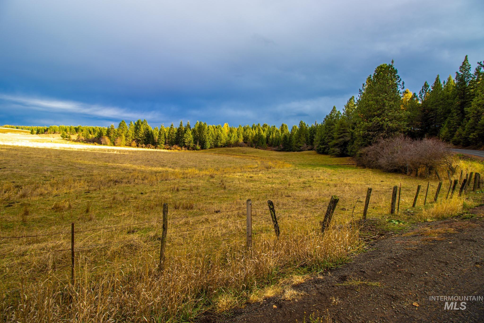 View of yard with a view of countryside