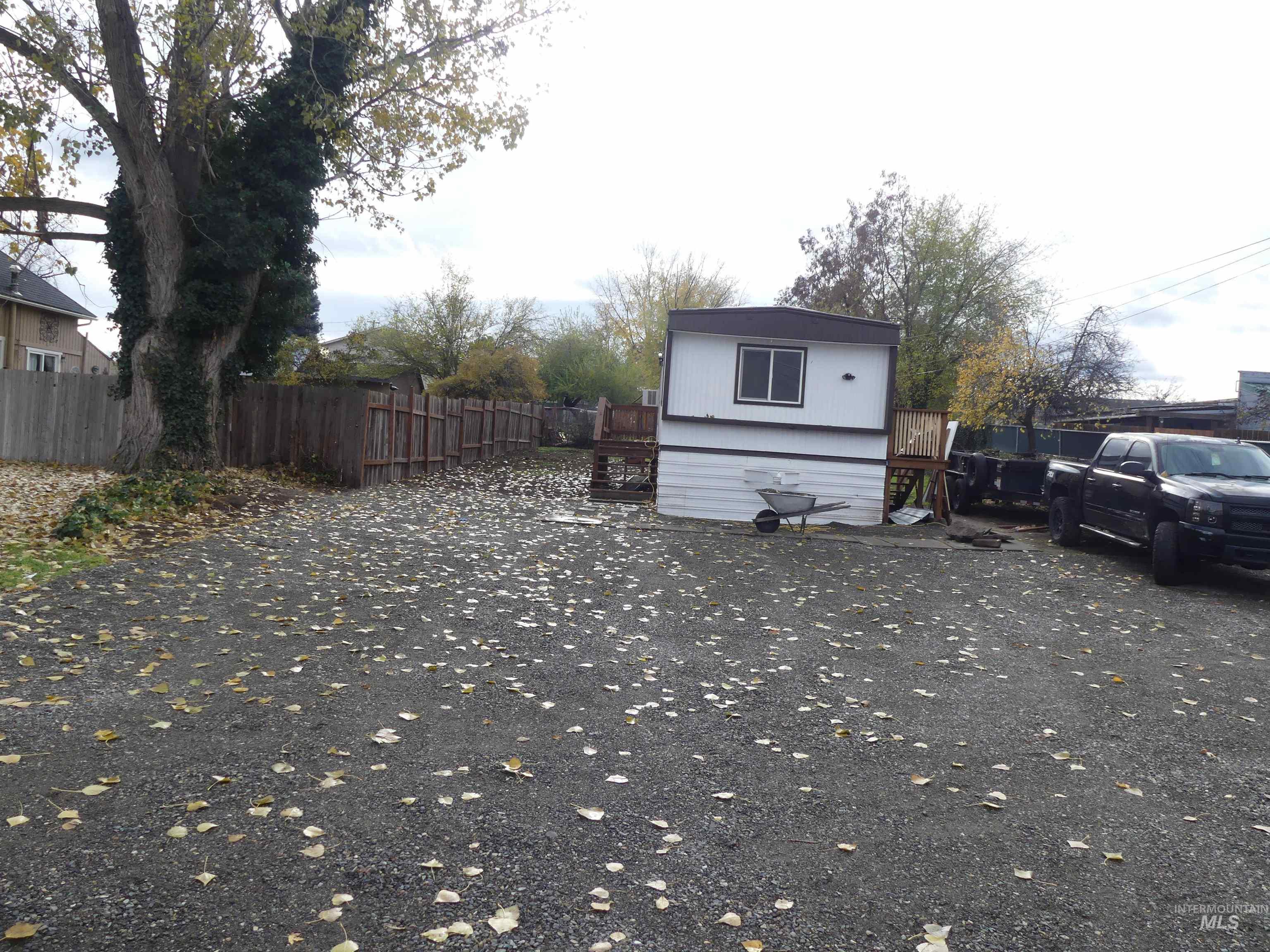 View of side of home with a patio area