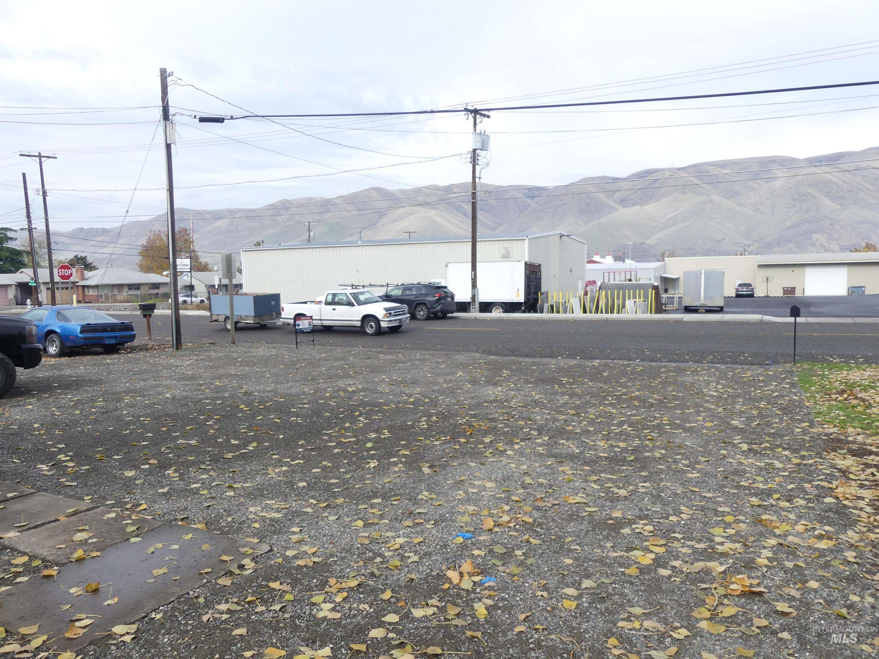 View of street with a mountain view and traffic signs