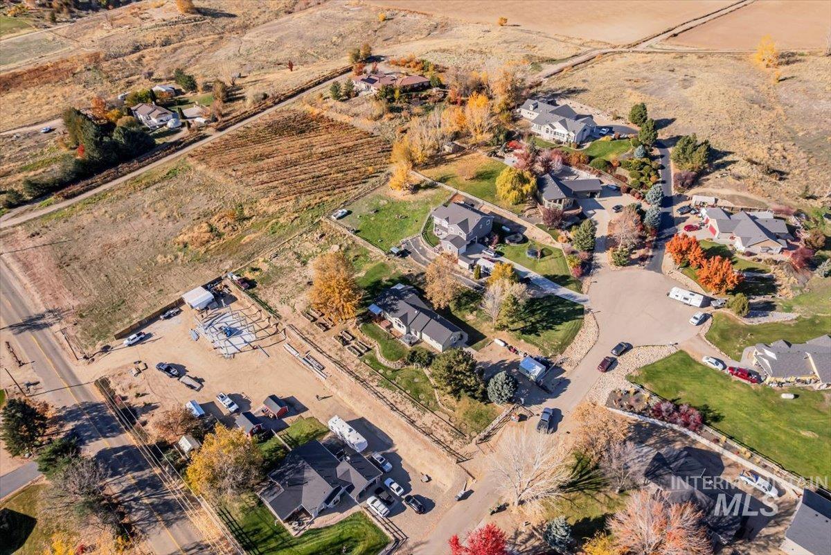 Aerial view of property and surrounding area with rural landscape