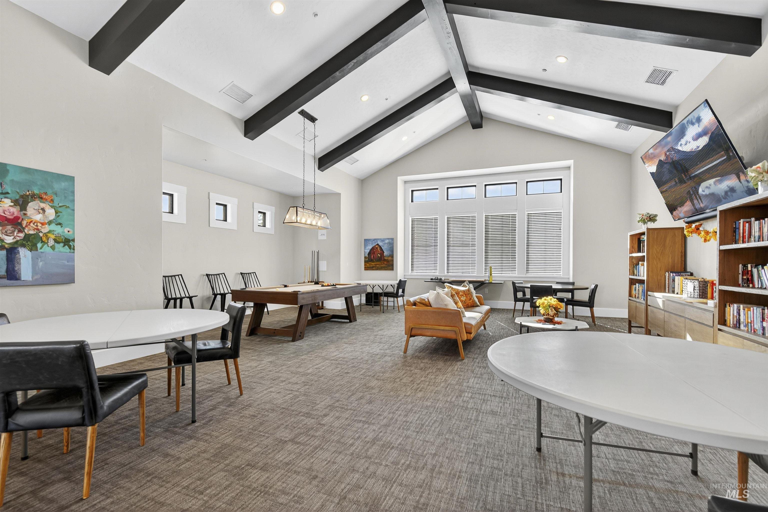 Game room with beam ceiling, recessed lighting, and high vaulted ceiling