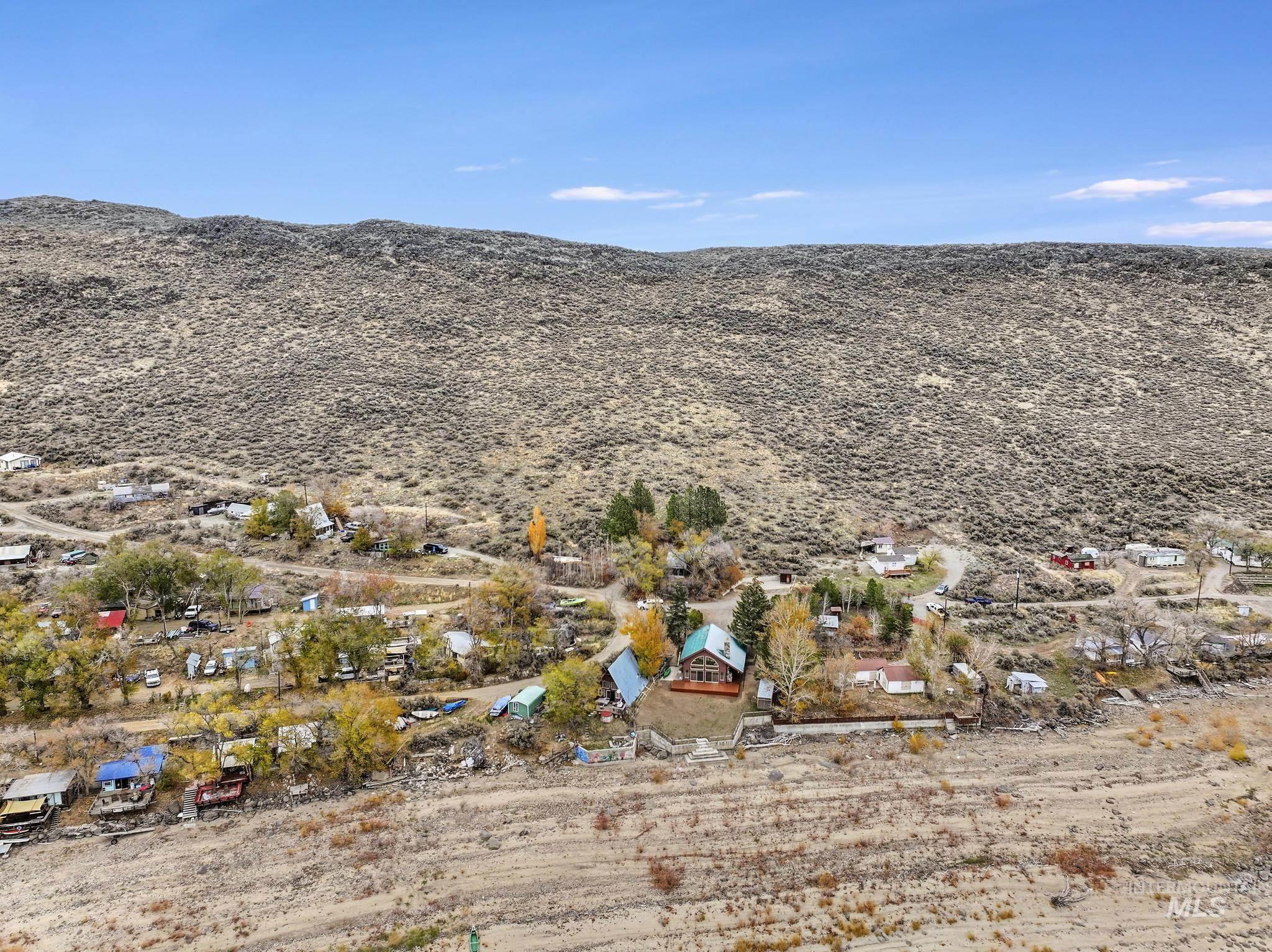 View of mountain background featuring rural landscape