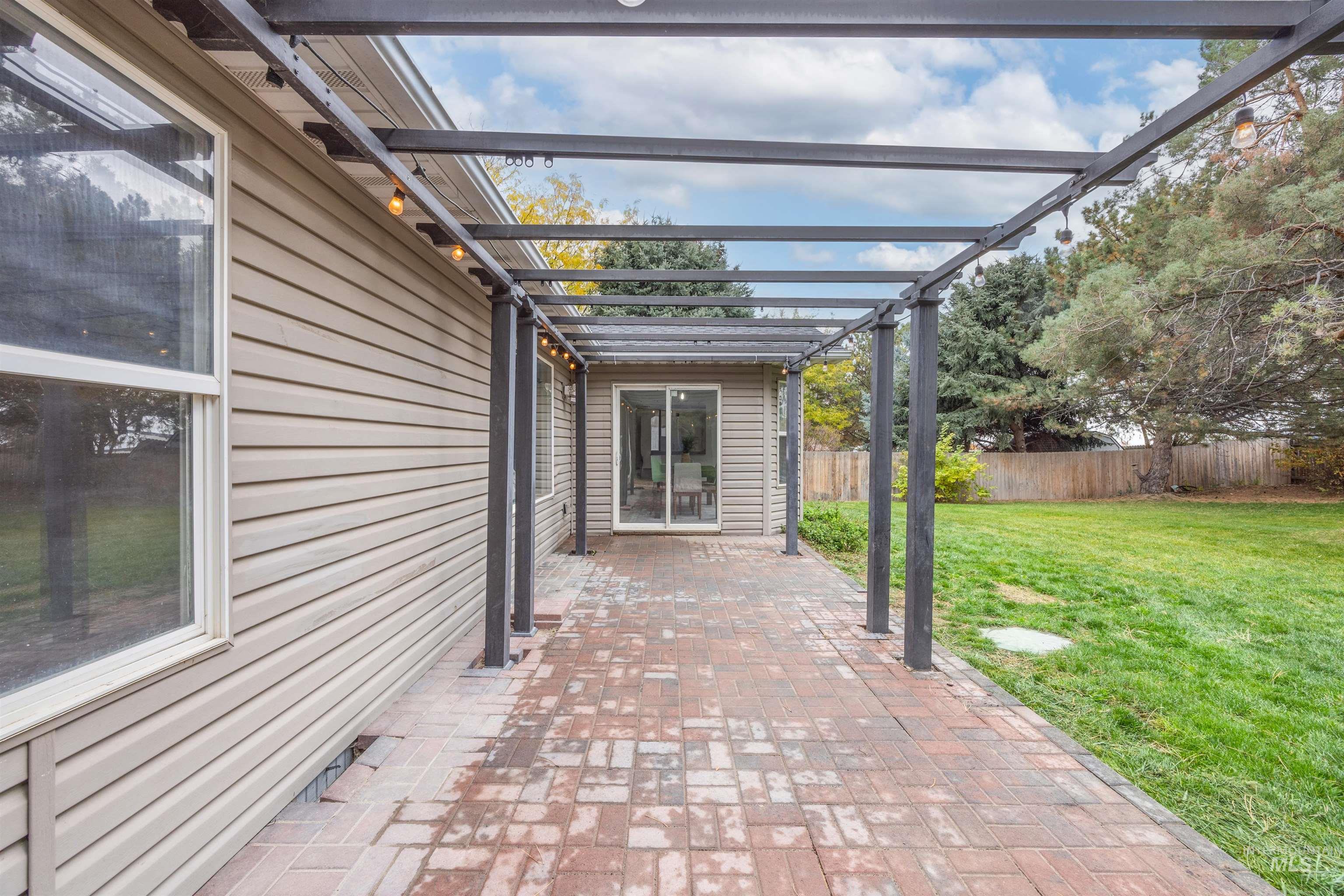 View of patio featuring a pergola