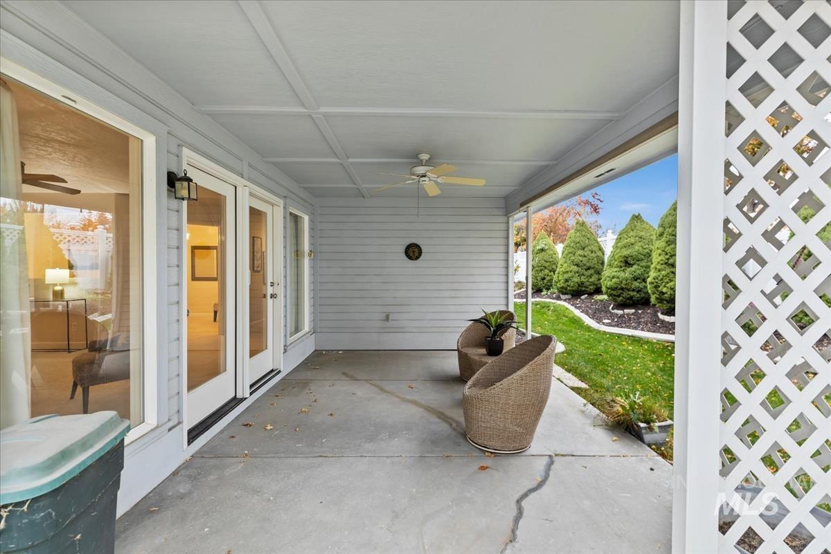 View of patio featuring ceiling fan