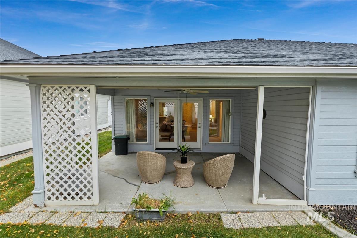 View of patio featuring a ceiling fan
