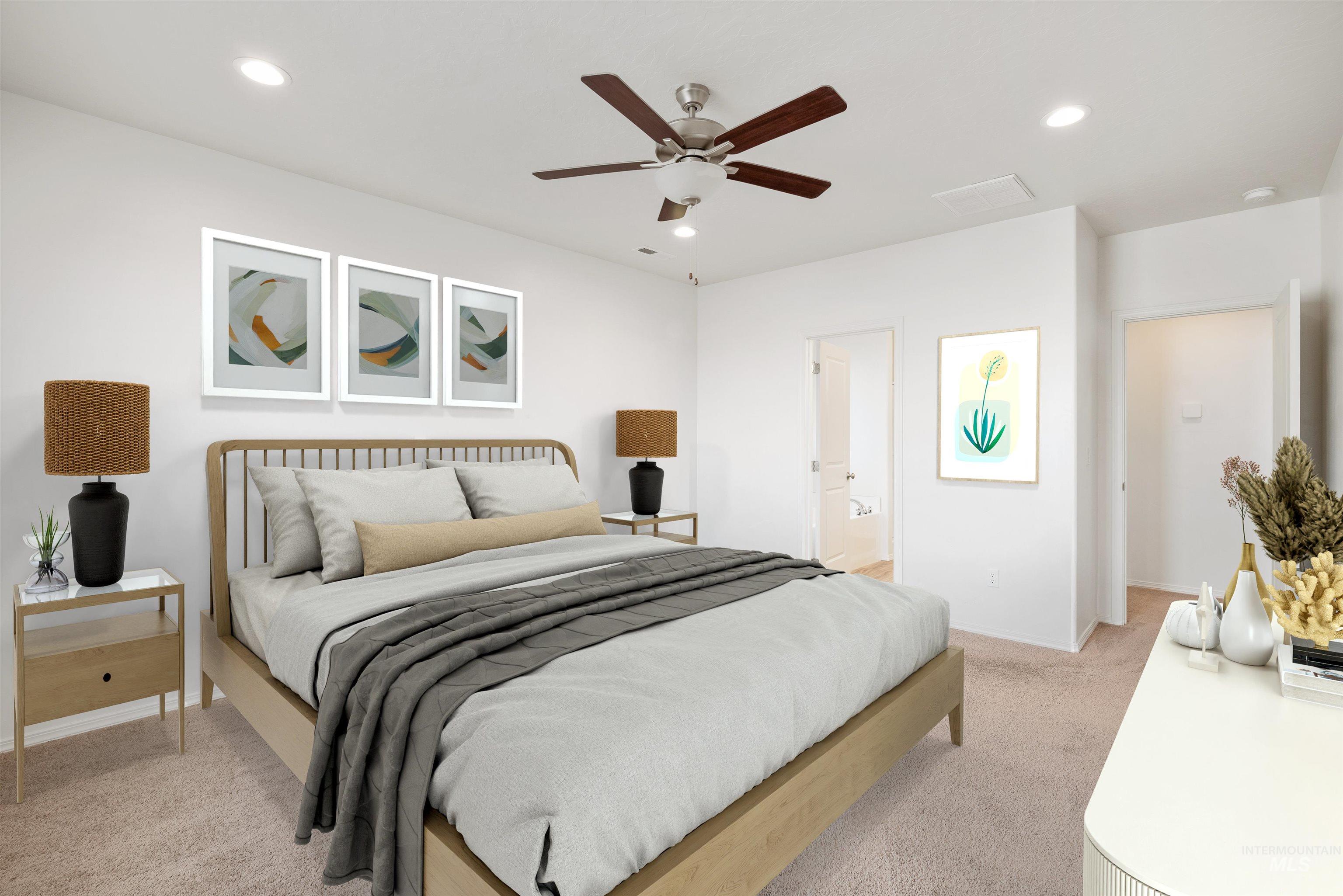Bedroom with recessed lighting, light carpet, ceiling fan, and ensuite bath