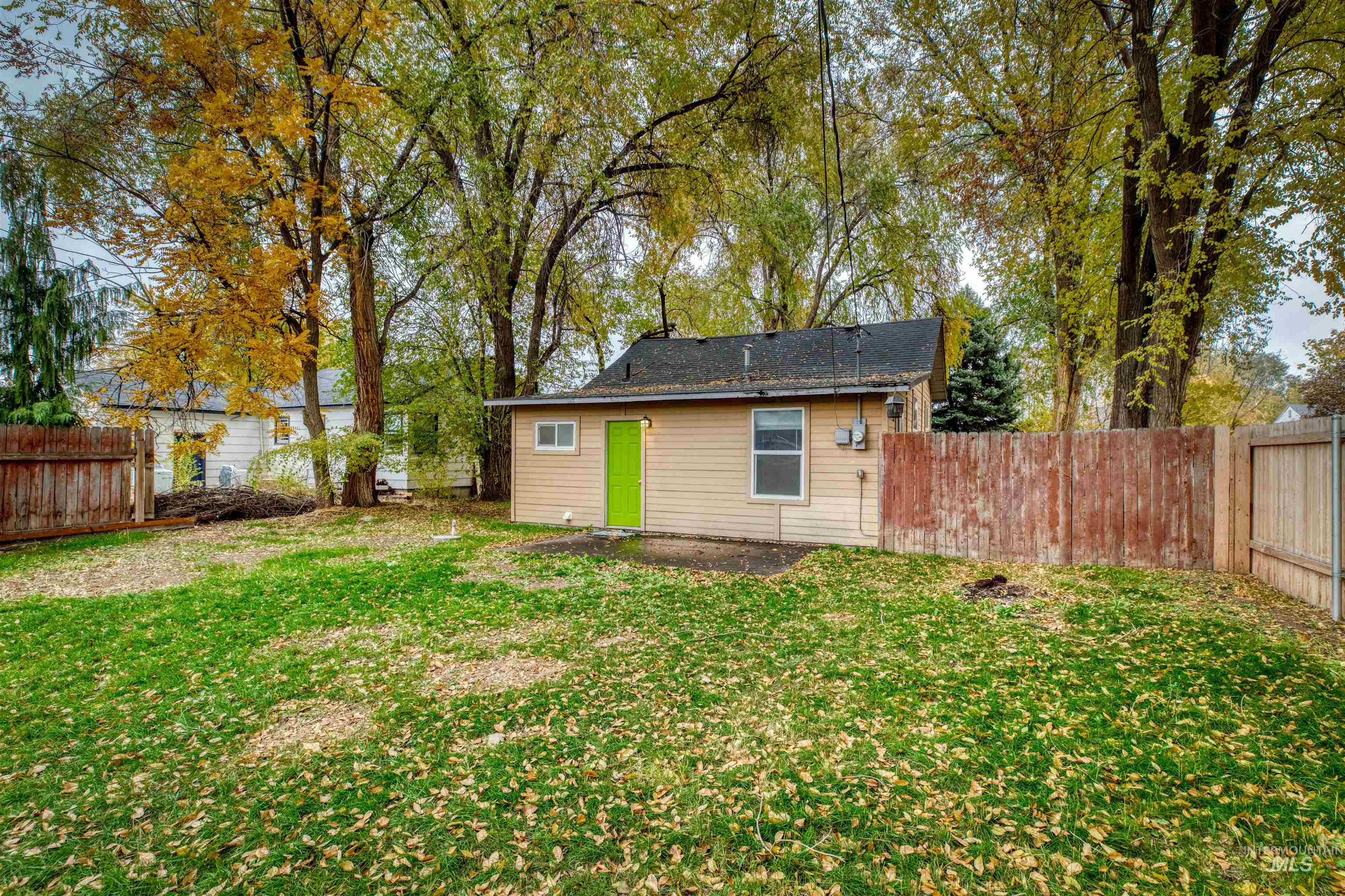 Back of house featuring a fenced backyard