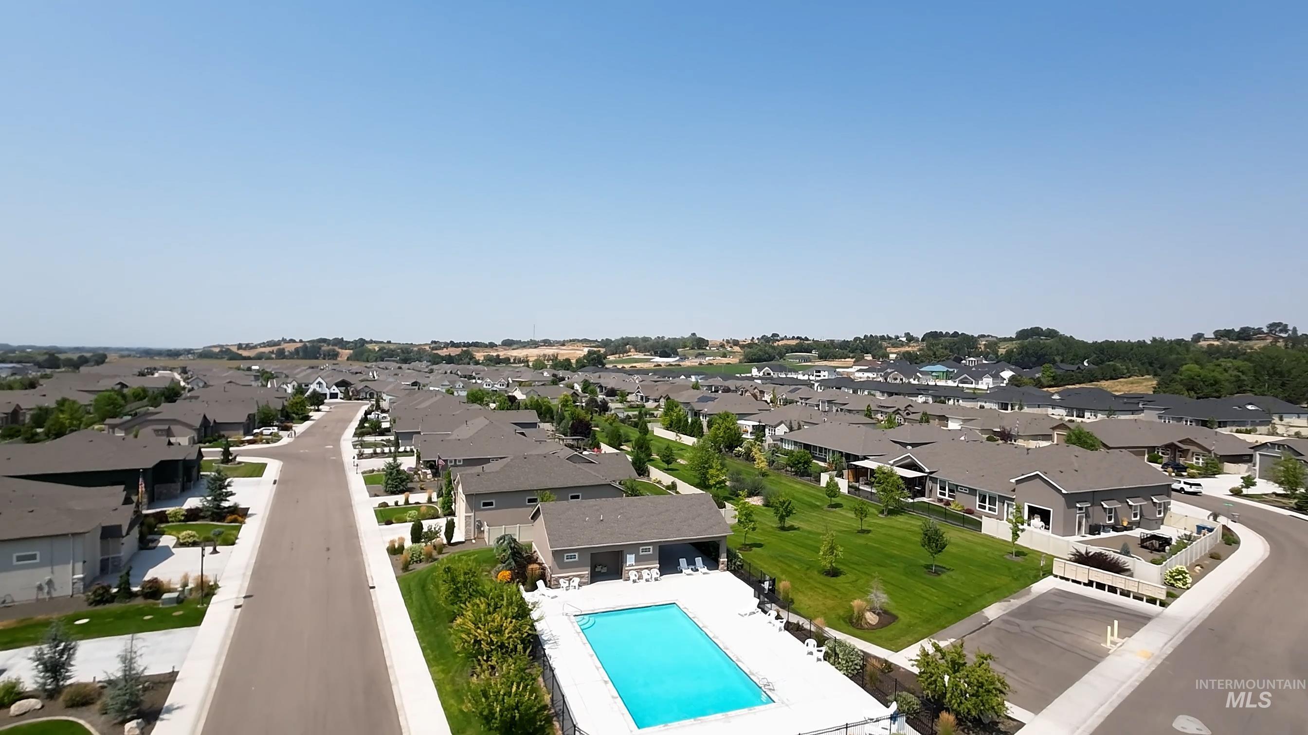 Aerial view of residential area with a pool