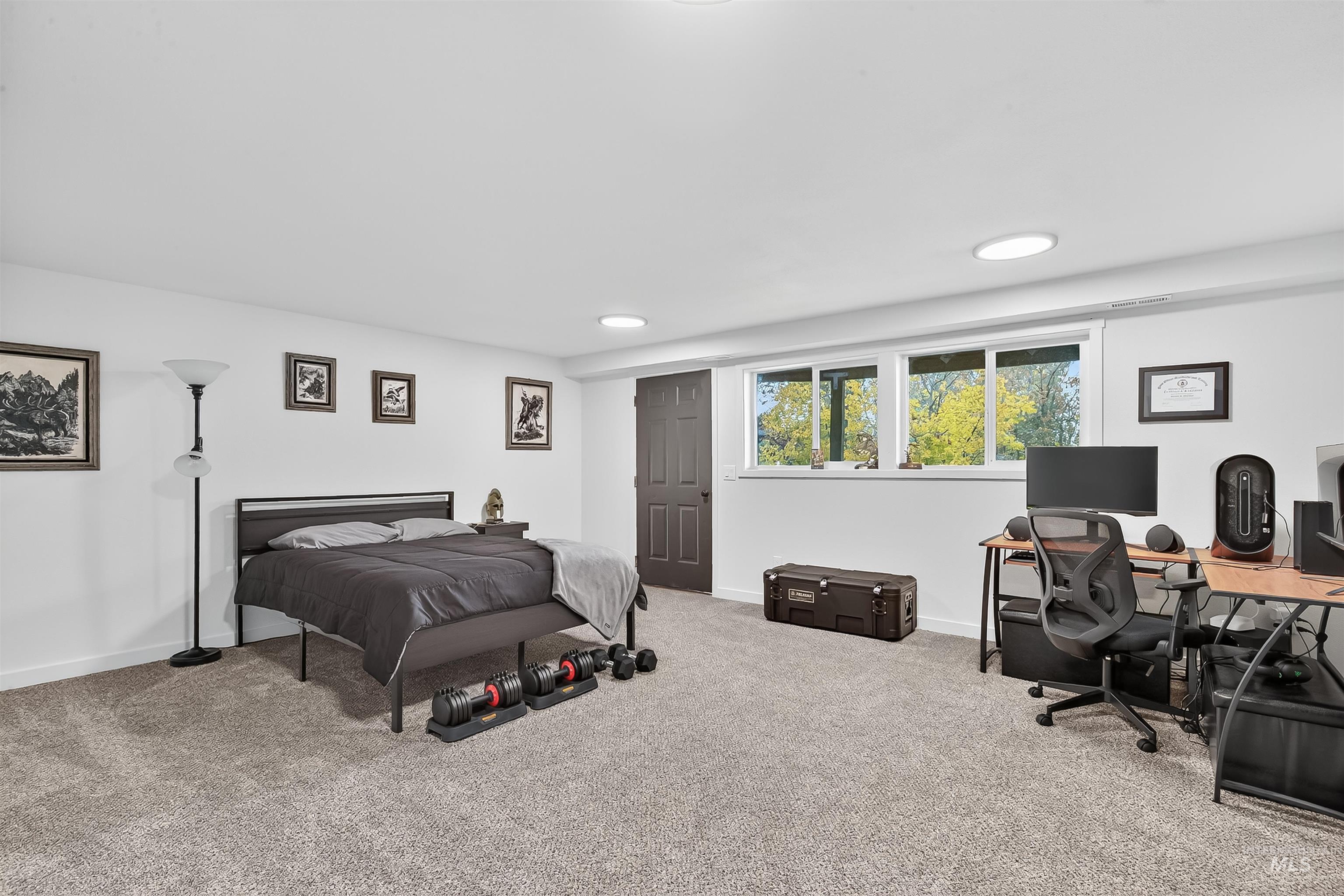 Bedroom featuring an office area, carpet floors, and recessed lighting