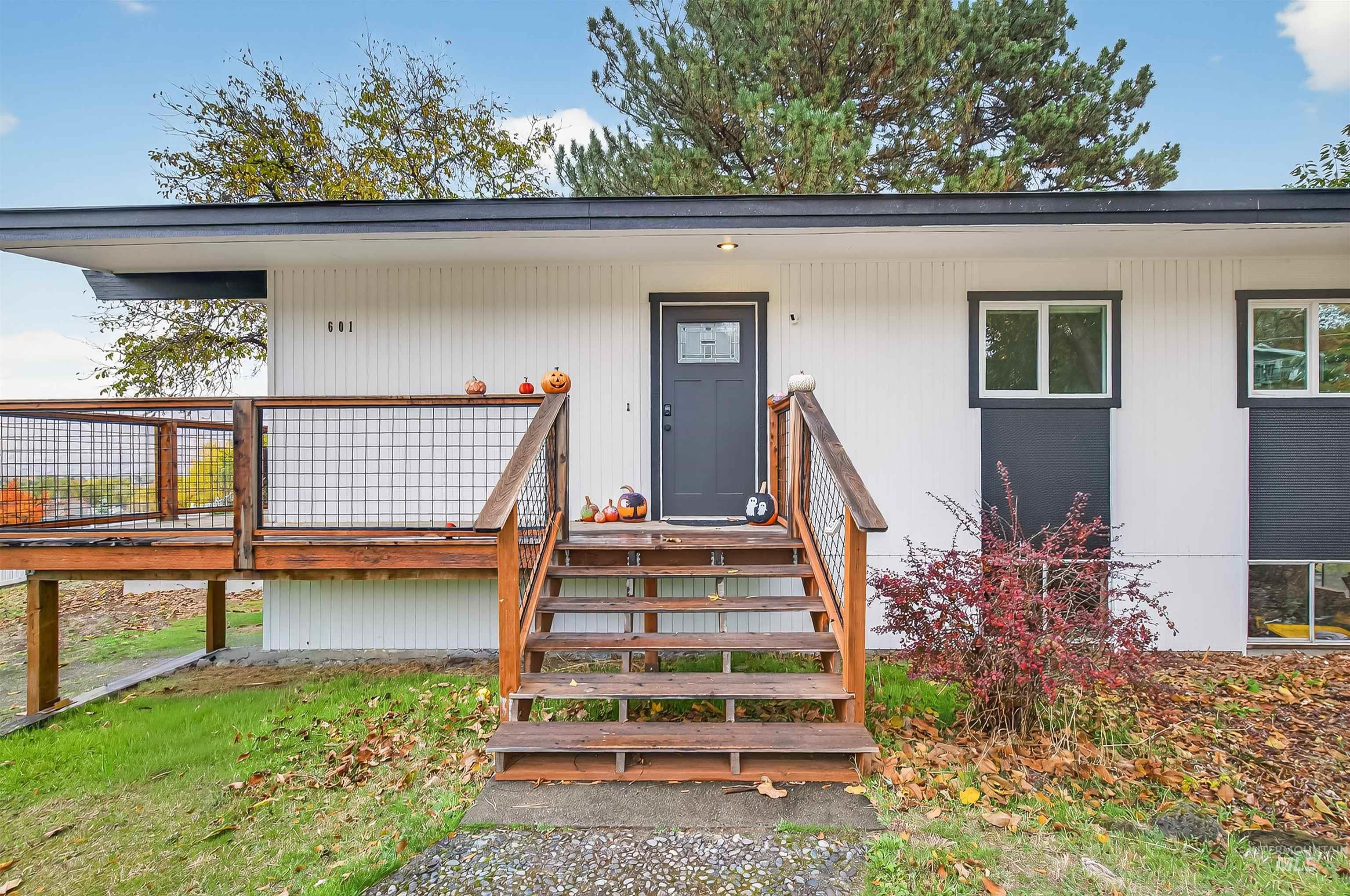 Property entrance featuring a deck