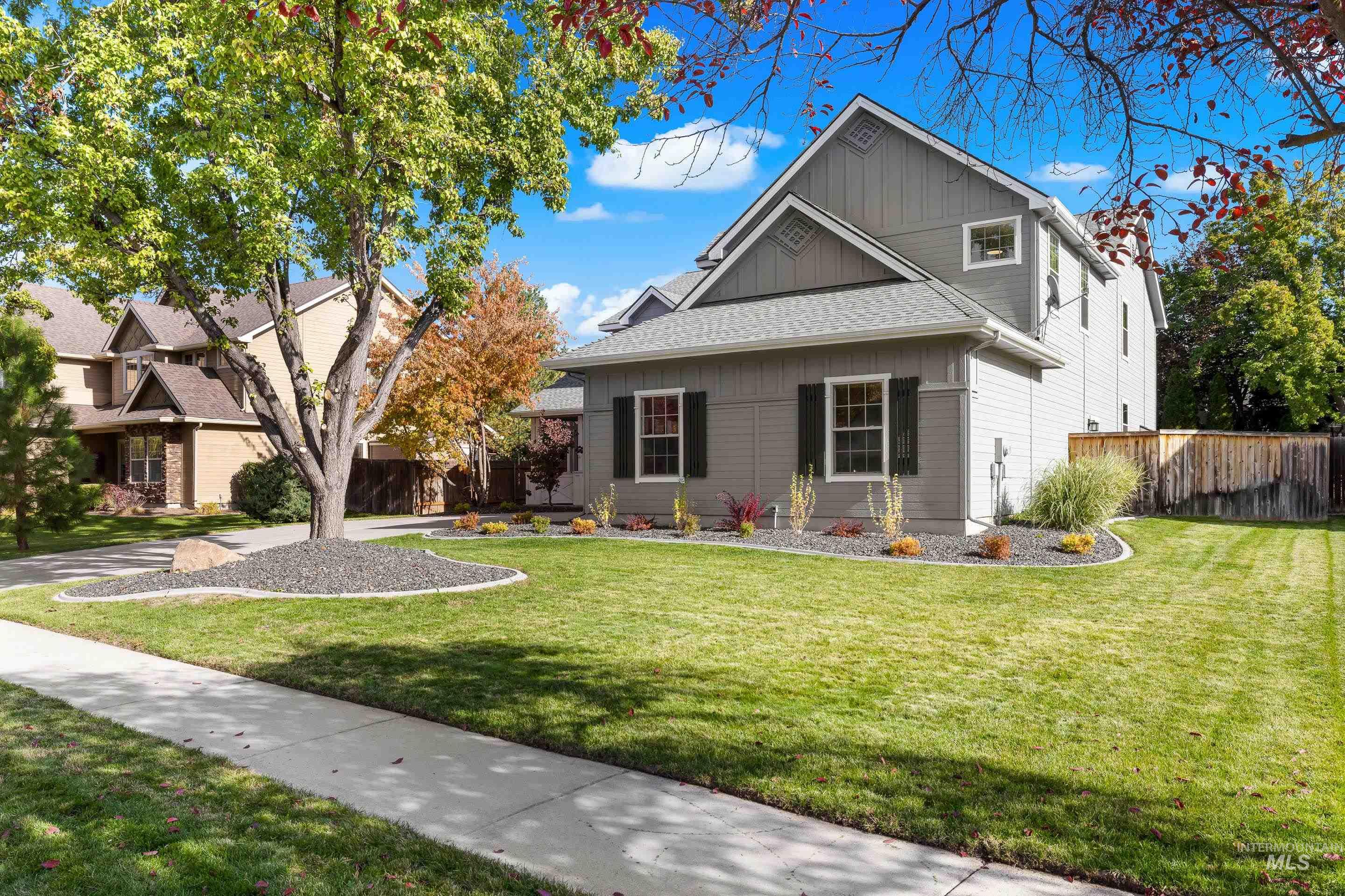 View of front facade with board and batten siding