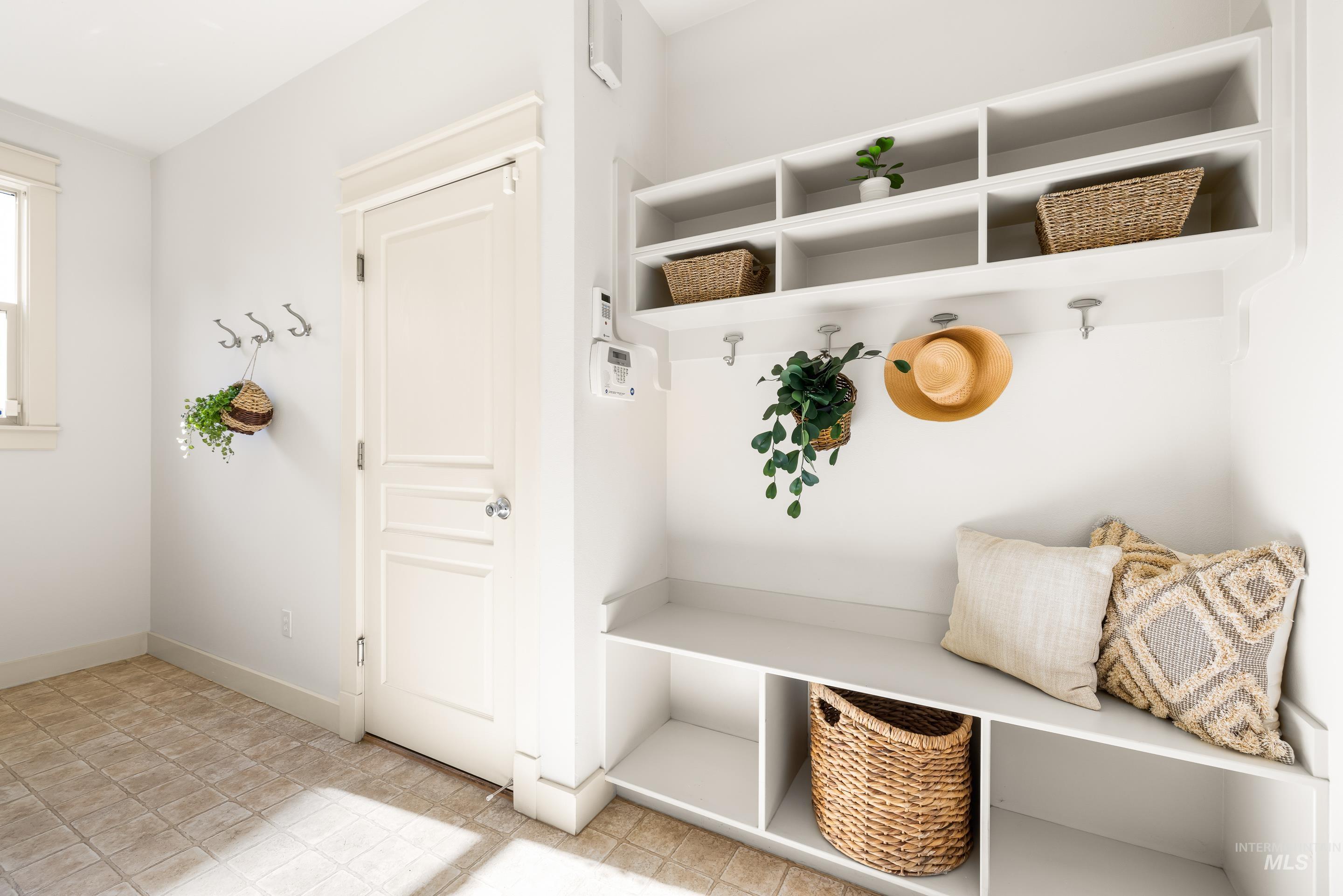 Mudroom featuring baseboards